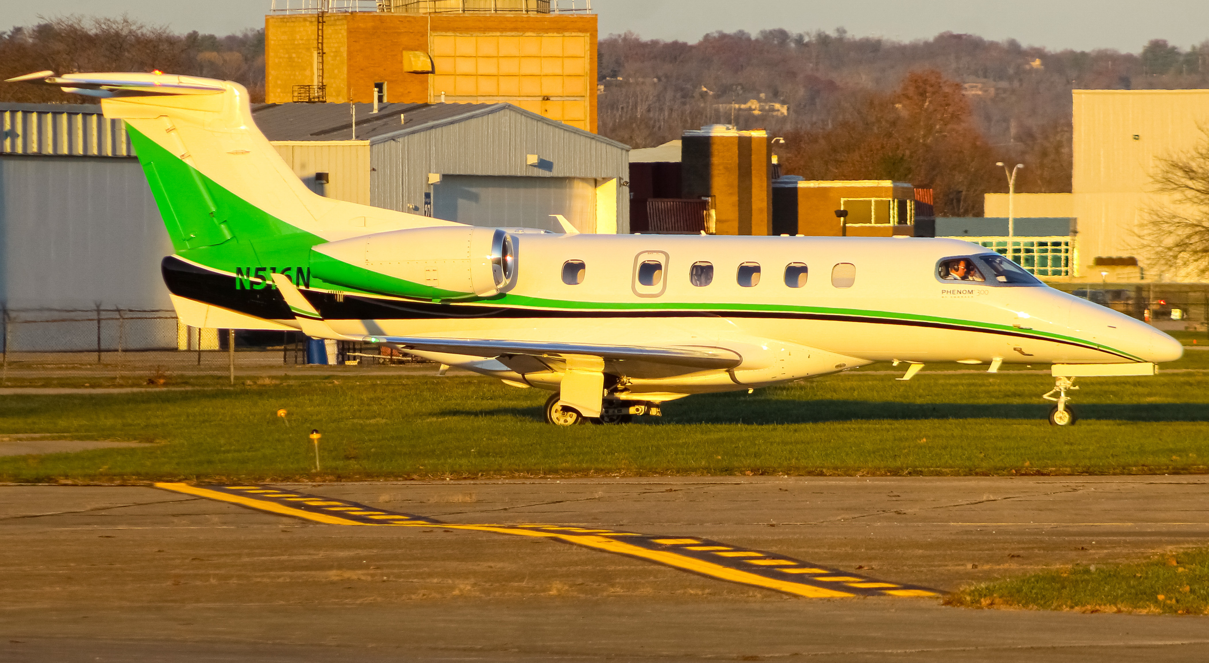 Full size: PRIVATE  Embraer Phenom 300 N516N at Cincinnati Municipal Airport/Lunken Field