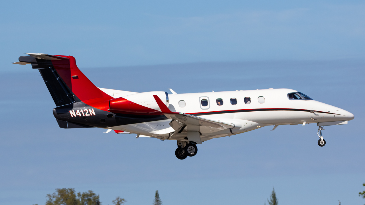 Full size: PRIVATE Embraer Phenom 300 N412N at Naples Municipal Airport