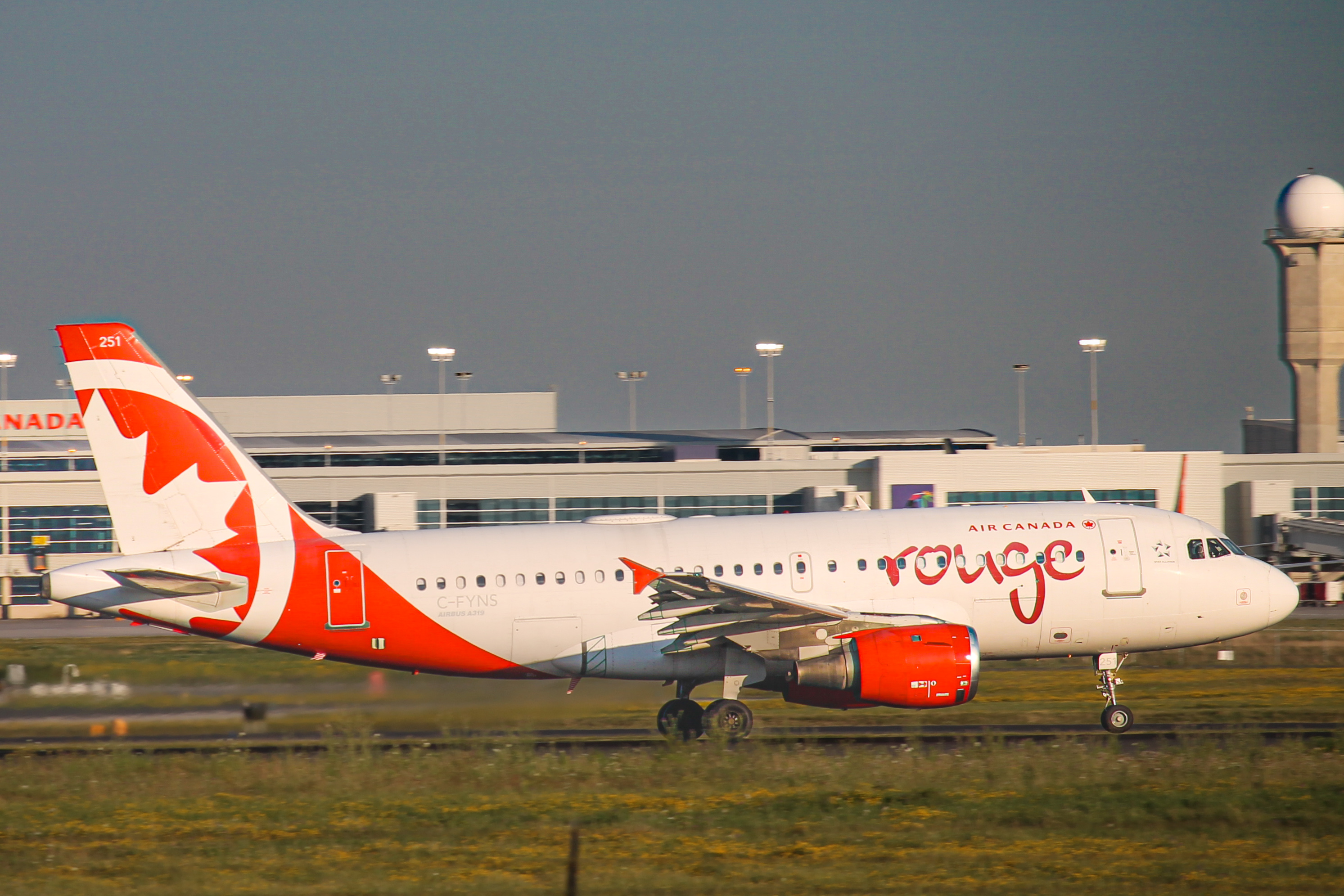 Full size: Air Canada Rouge Airbus A319 C-FYNS at Lester B Pearson International Airport