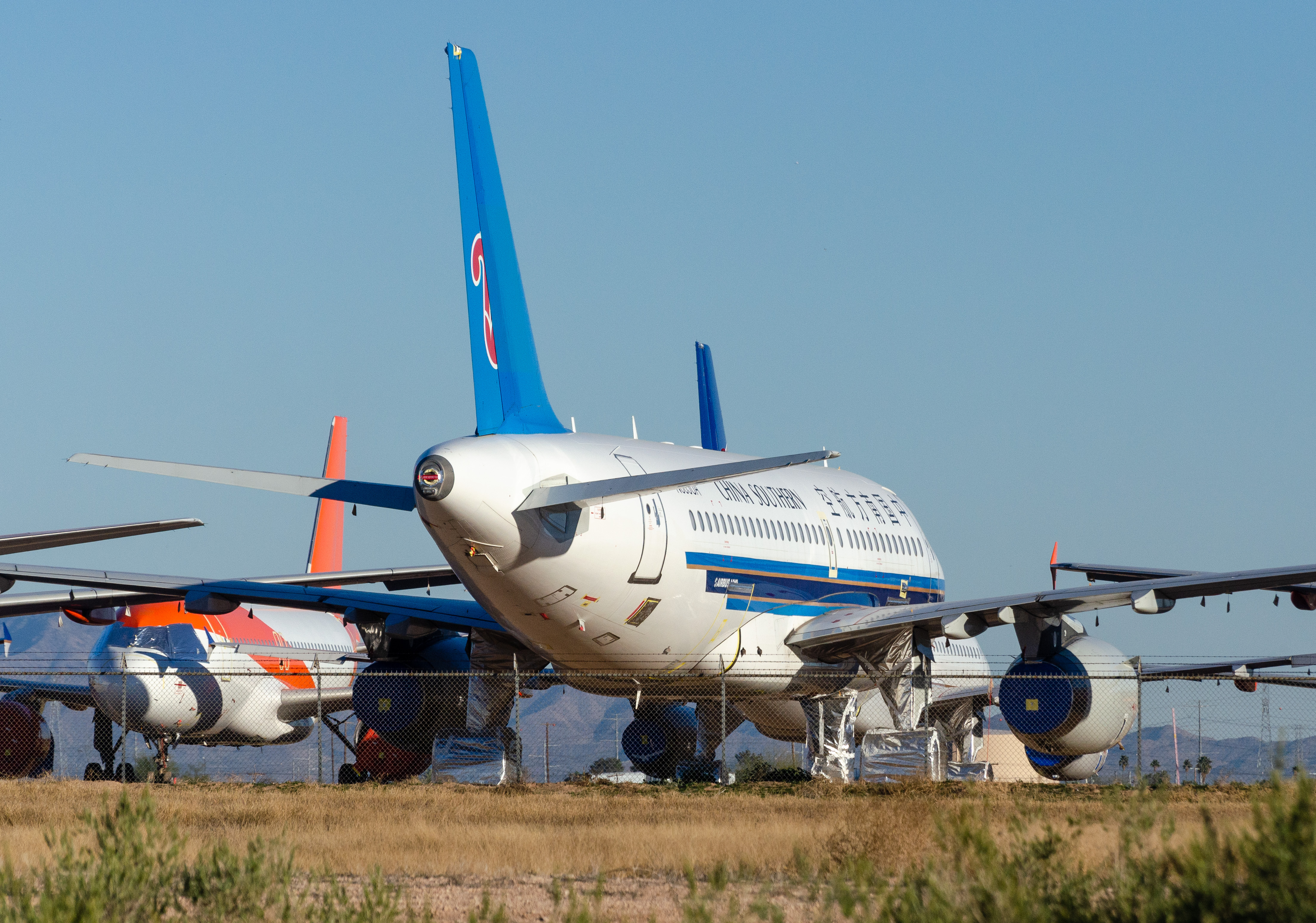 Full size: China Southern Airlines Airbus A319 N883UA at Phoenix Goodyear Airport