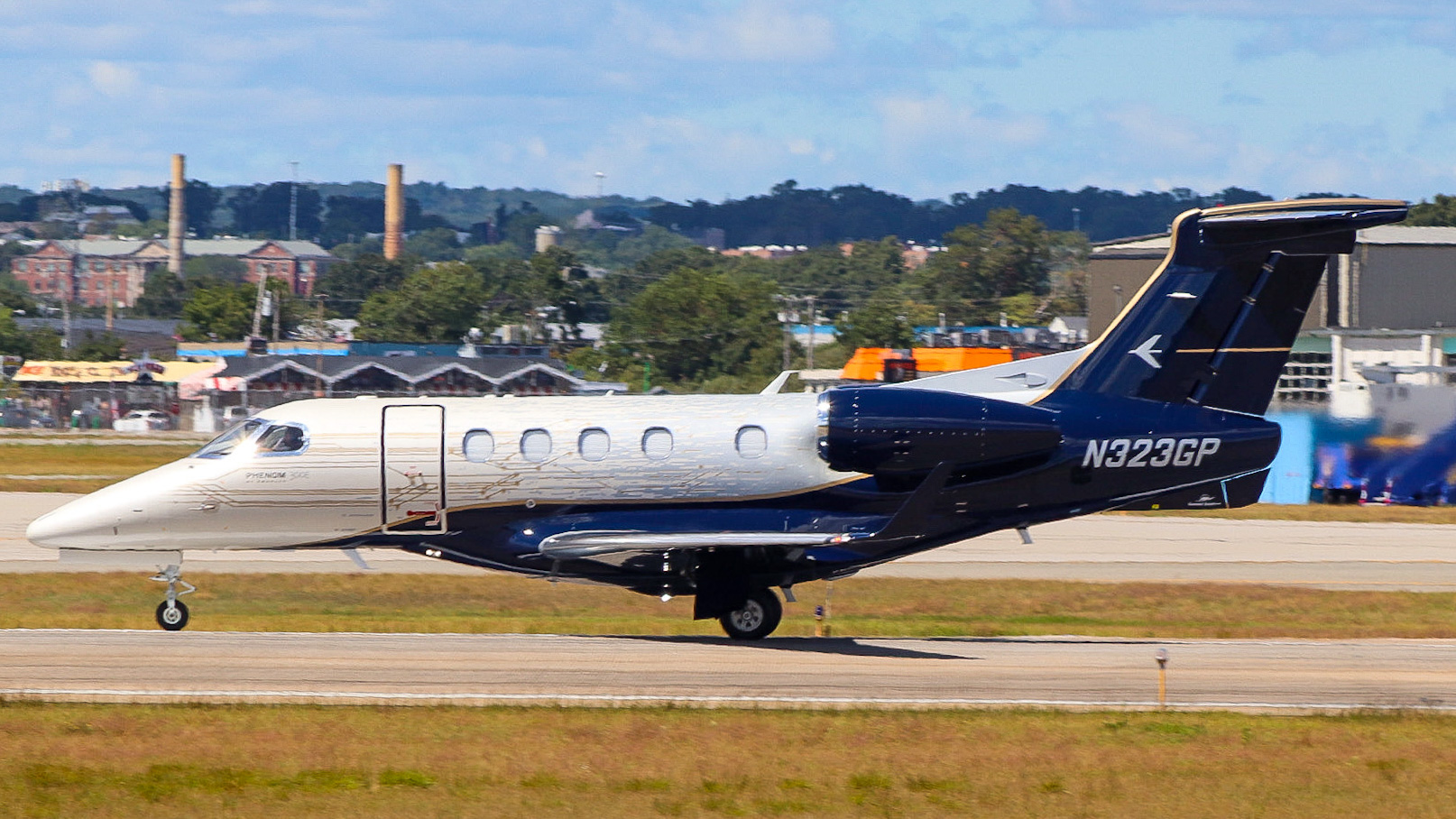 Full size: PRIVATE Embraer Phenom 300 N323GP at Theodore Francis Green State Airport