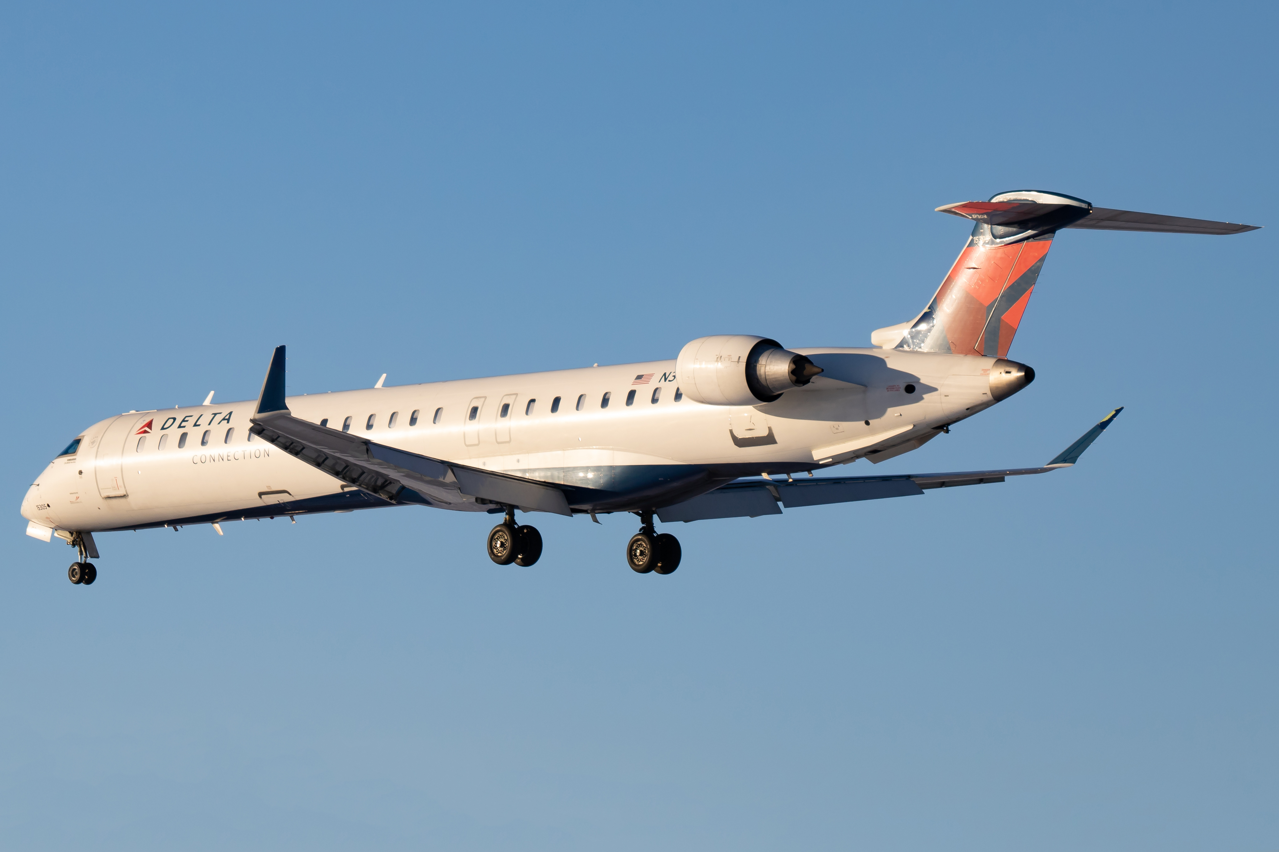 Full size: Delta Connection Mitsubishi CRJ-900 N305PQ at Cedar Rapids Eastern Iowa Airport