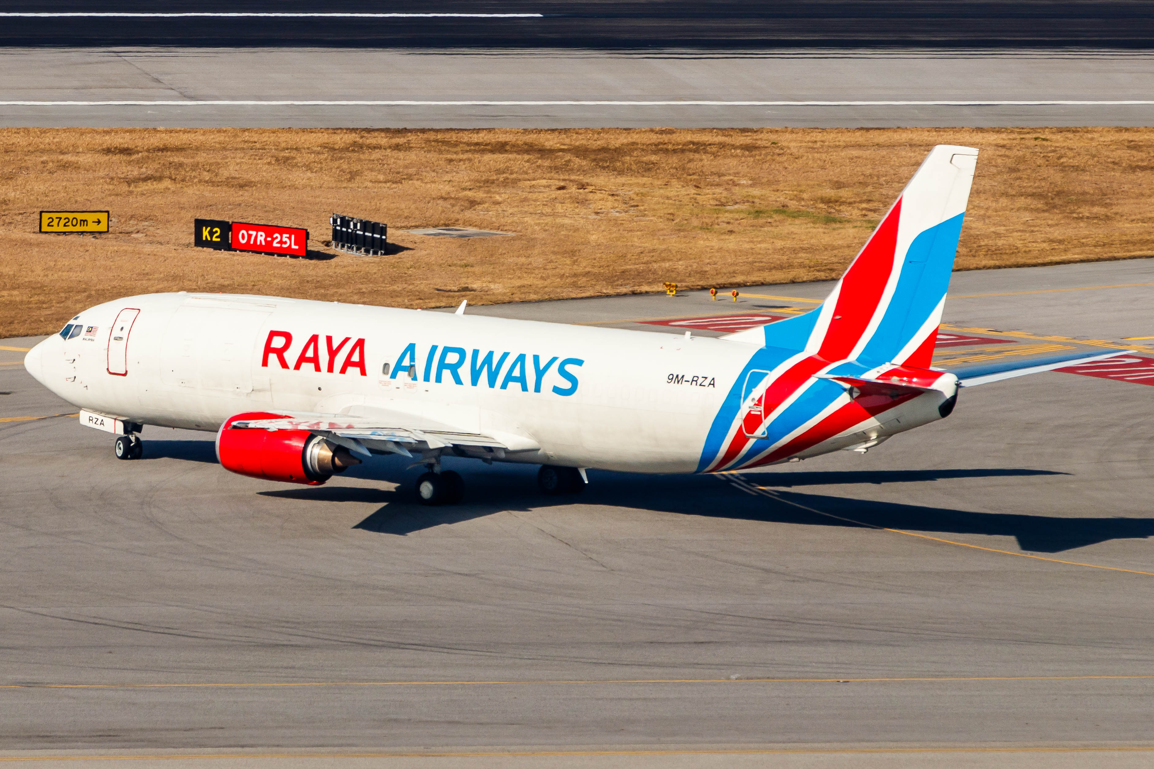 Full size: RAYA AIRWAYS Boeing 737-400F 9M-RZA at Hong Kong International Airport