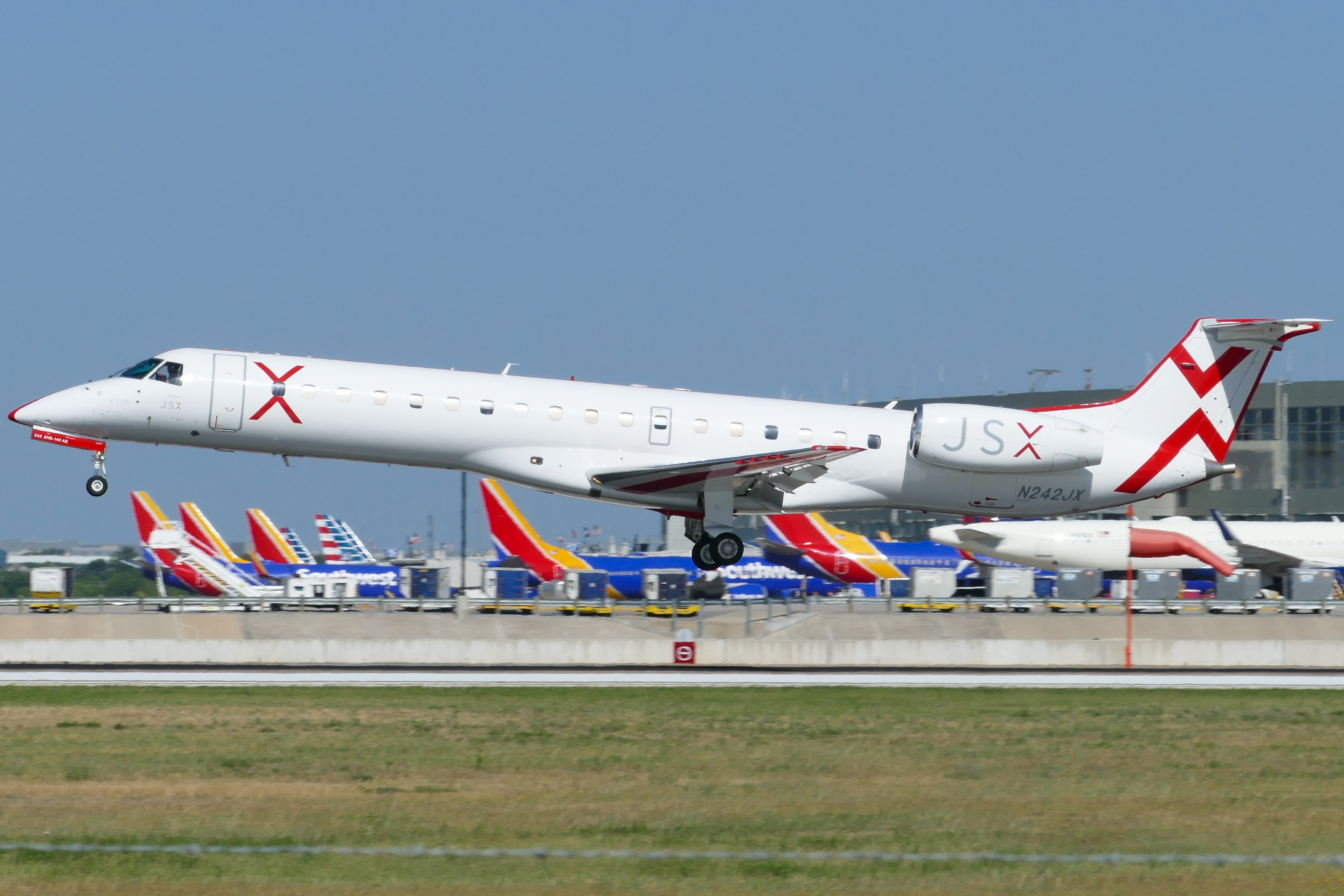 Full size: JSX Embraer ERJ145 N242JX at Austin-Bergstrom International Airport