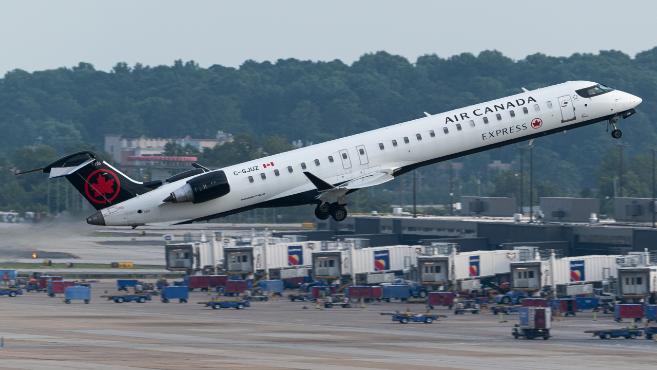 Full size: Air Canada Express Mitsubishi CRJ-900 C-GJUZ at Hartsfield-Jackson Atlanta International Airport