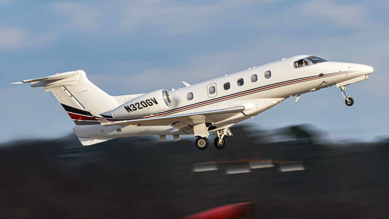 Full size: PRIVATE Embraer Phenom 300 N320GV at Atlanta DeKalb Peachtree Airport