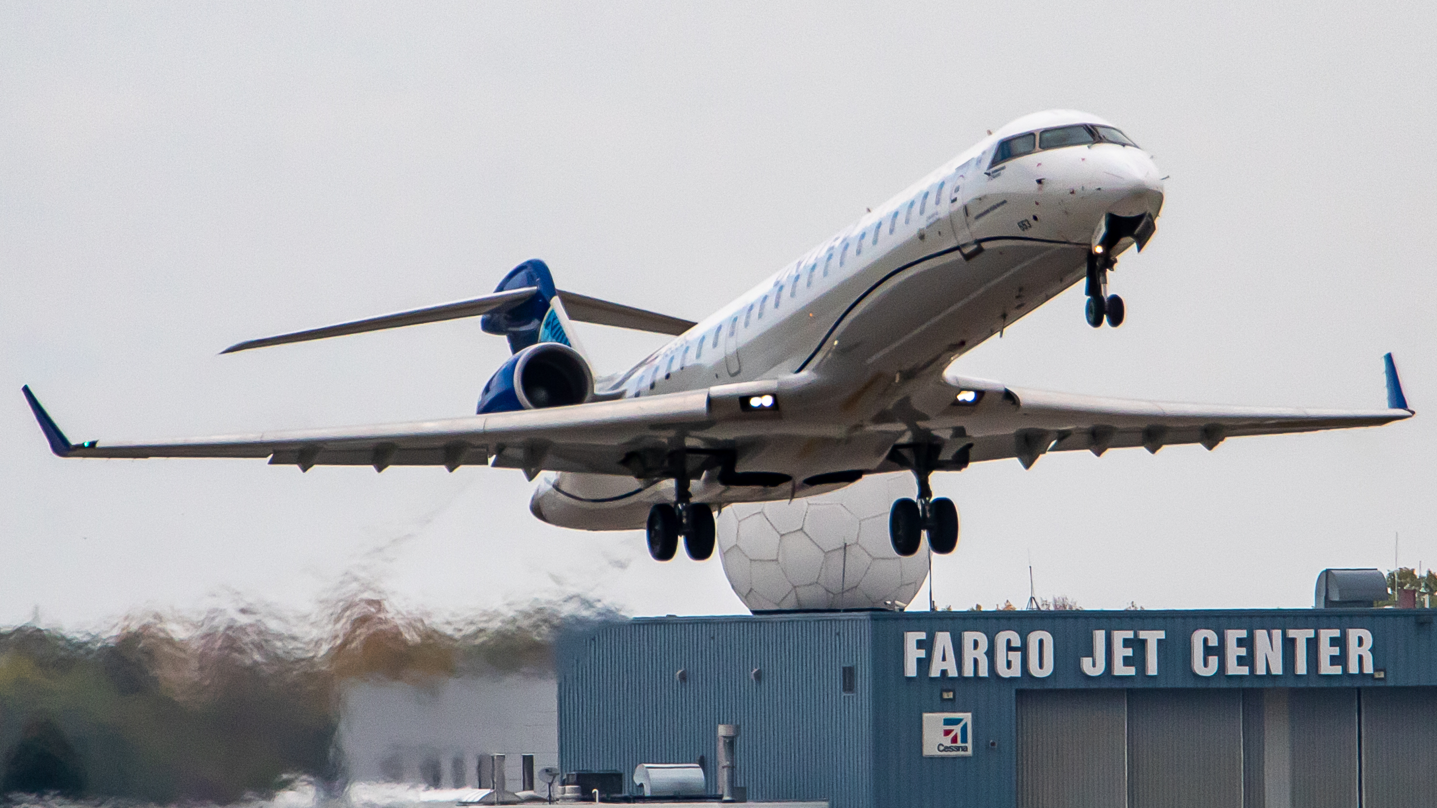 Full size: United Express Mitsubishi CRJ-550 N553GJ at Hector International Airport