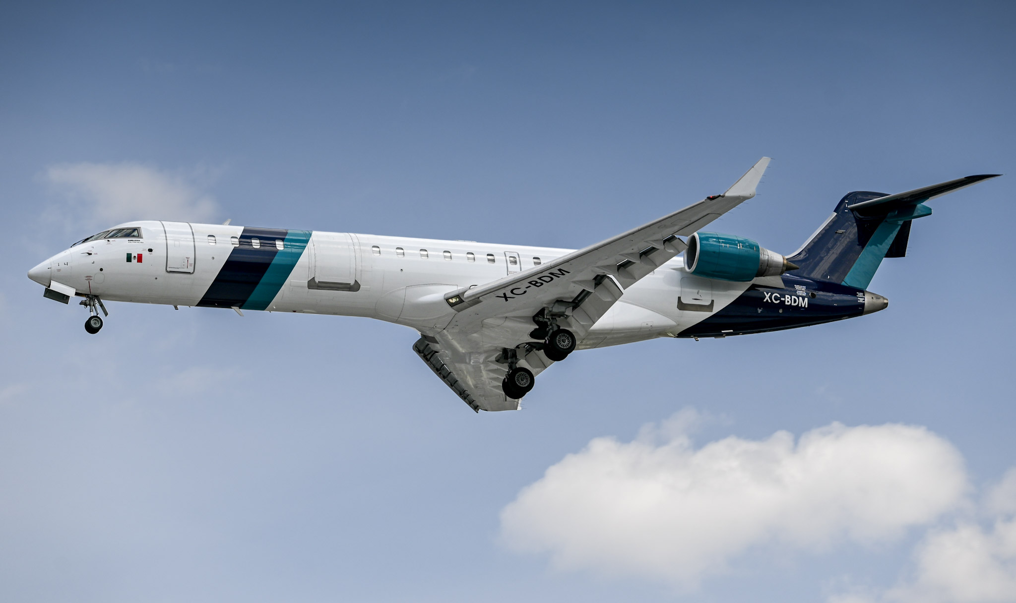 Full size: Bank of Mexico Mitsubishi CRJ-700 XC-BDM at Mexico City International Airport