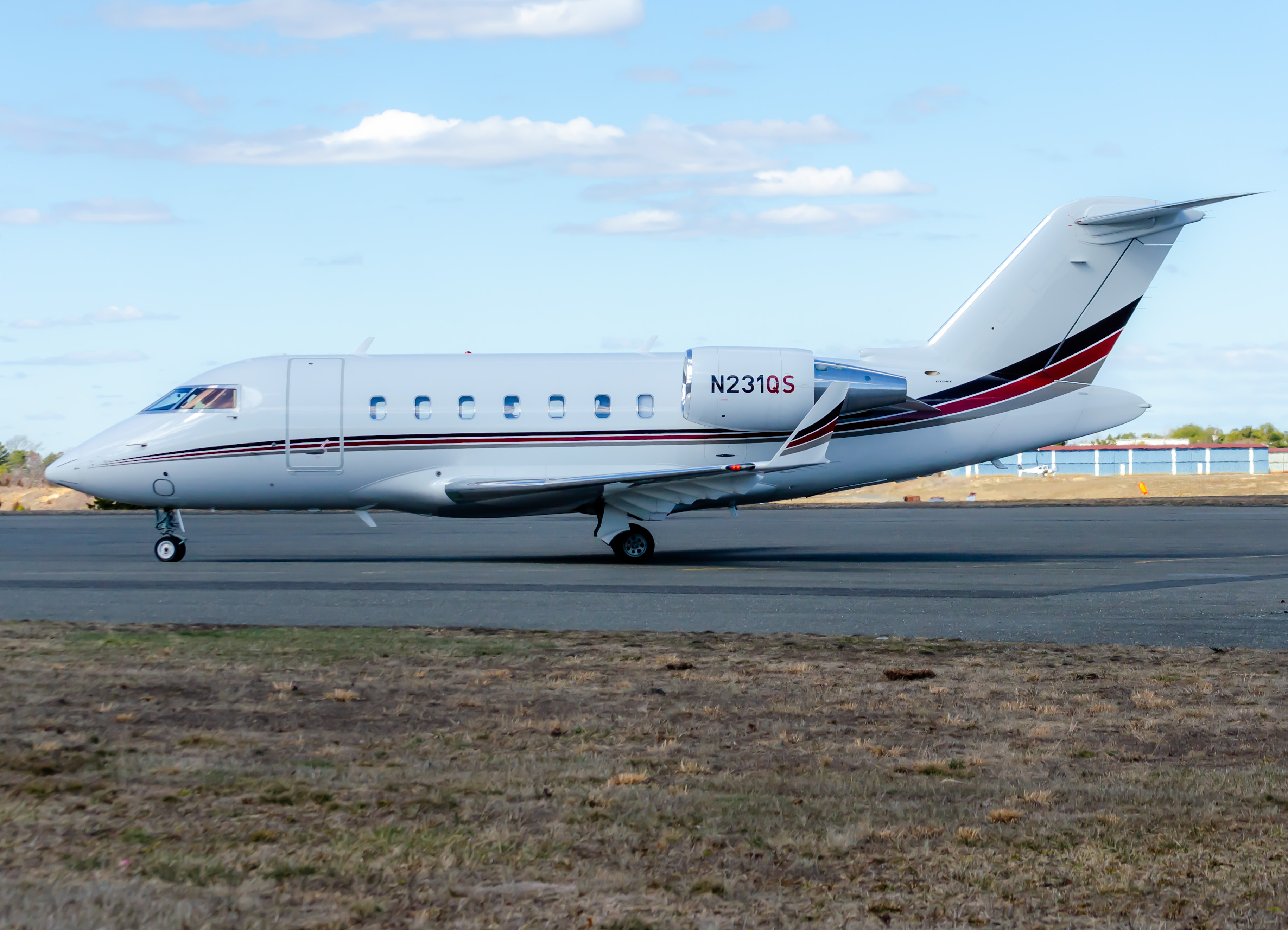 Full size: NetJets Bombardier Challenger 650 N231QS at Atlantic City Monmouth Executive Airport