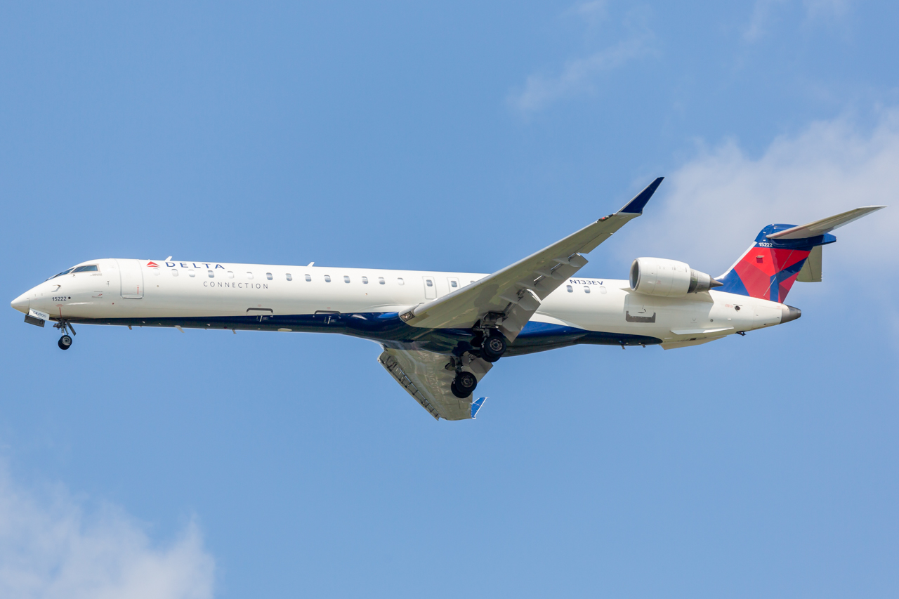 Full size: Delta Connection Mitsubishi CRJ-900 N133EV at John F. Kennedy International Airport