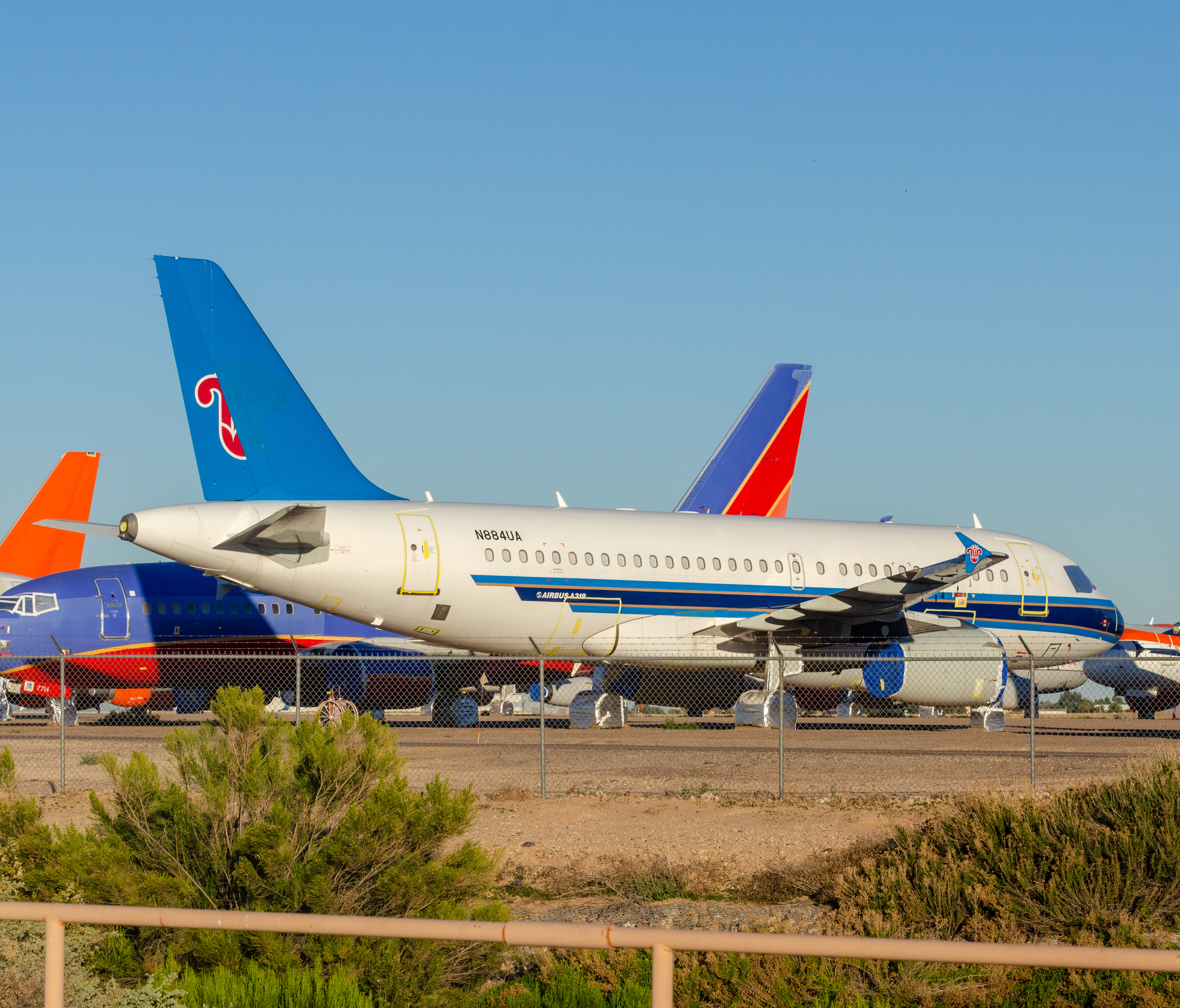 Full size: China Southern Airlines Airbus A319 N884UA at Phoenix Goodyear Airport
