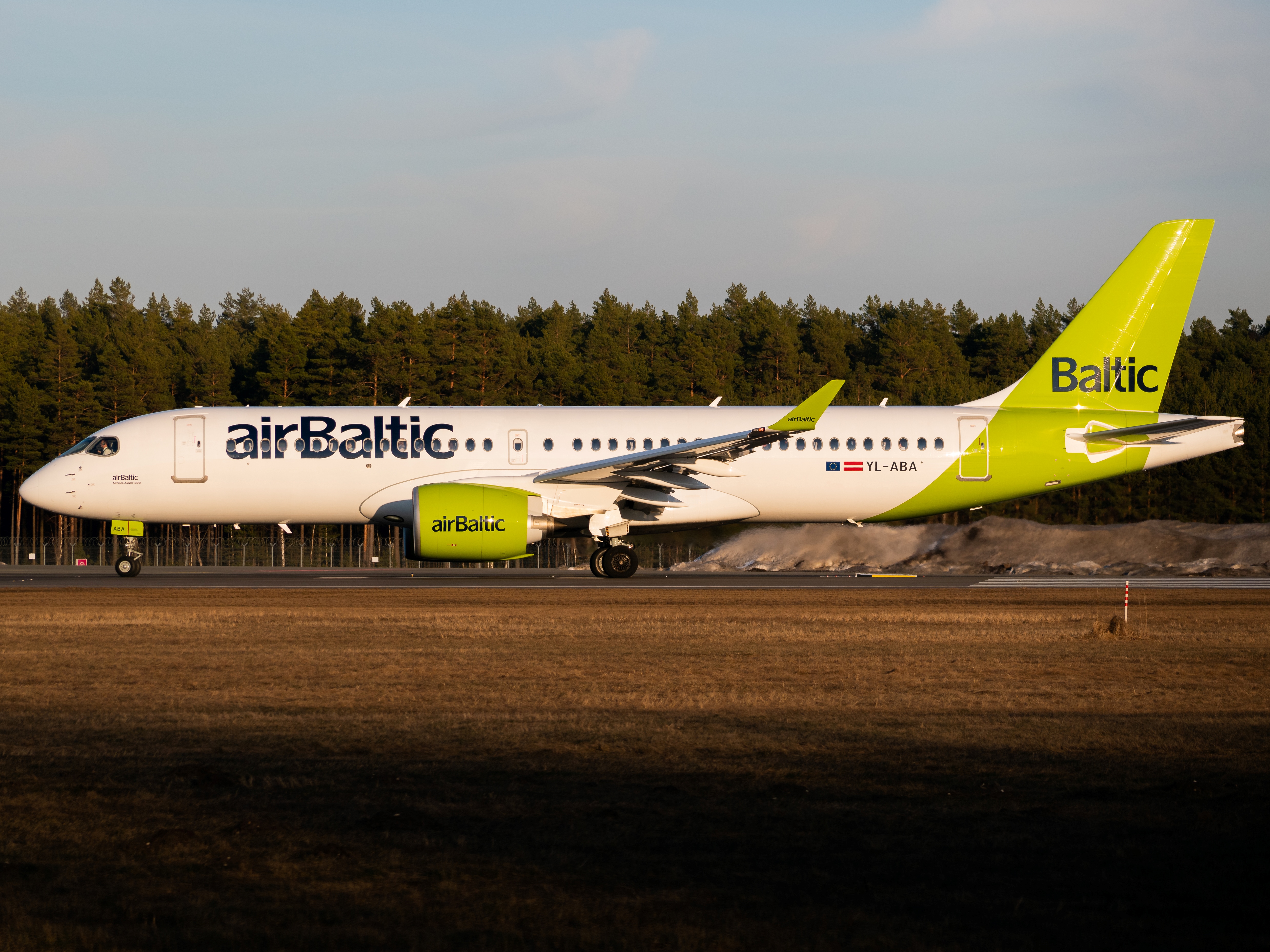 Full size: Air Baltic Airbus A220-300 YL-ABA at Riga International Airport