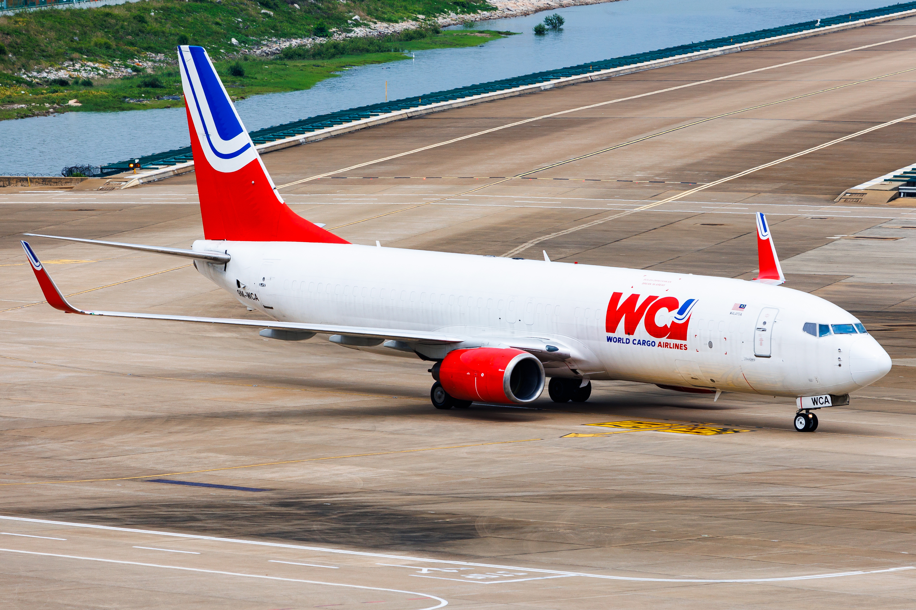 Full size: World Cargo Airlines Boeing 737-800 9M-WCA at Macau International Airport