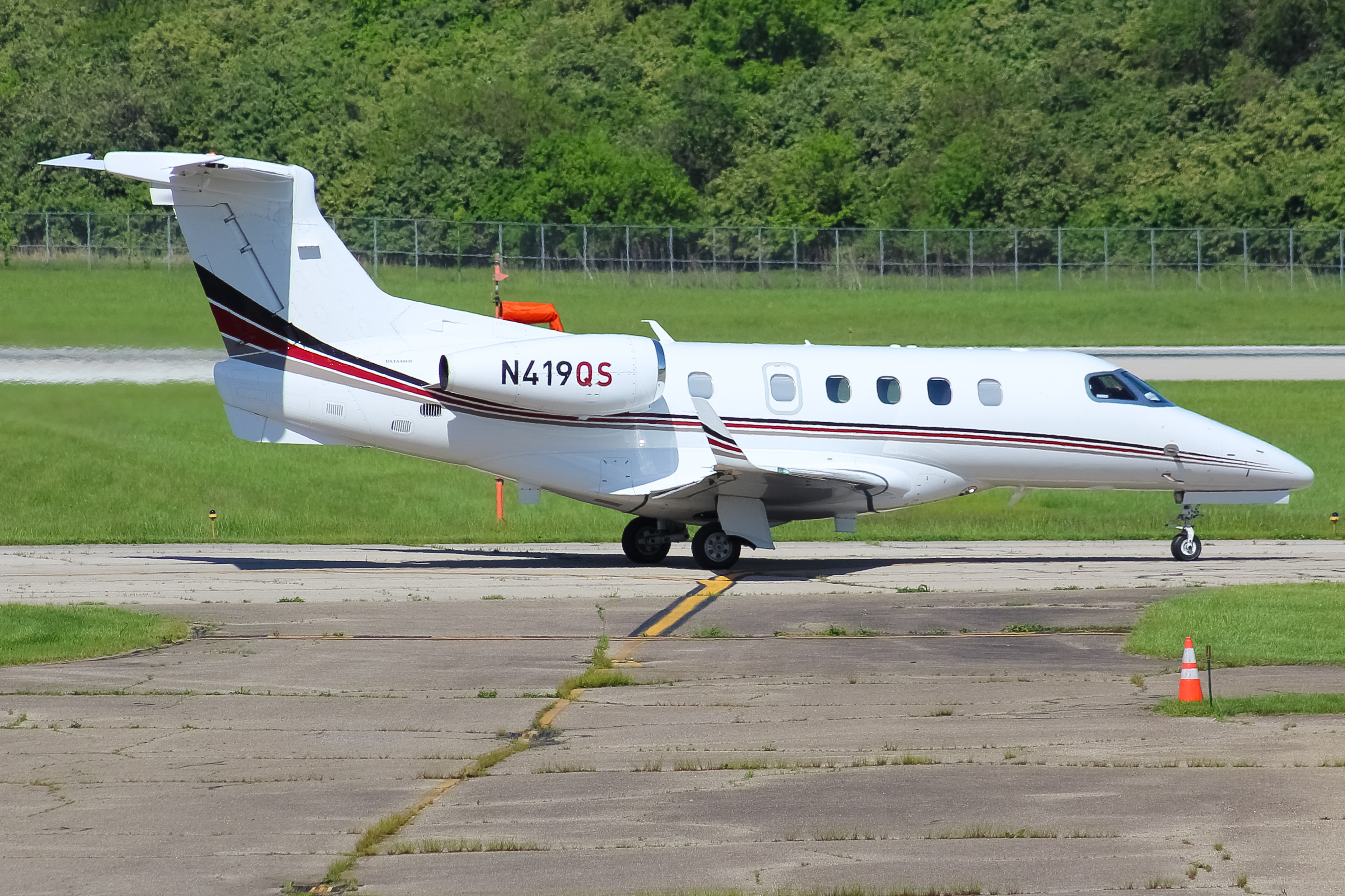 Full size: PRIVATE Embraer Phenom 300 N419QS at Cincinnati Municipal Airport/Lunken Field