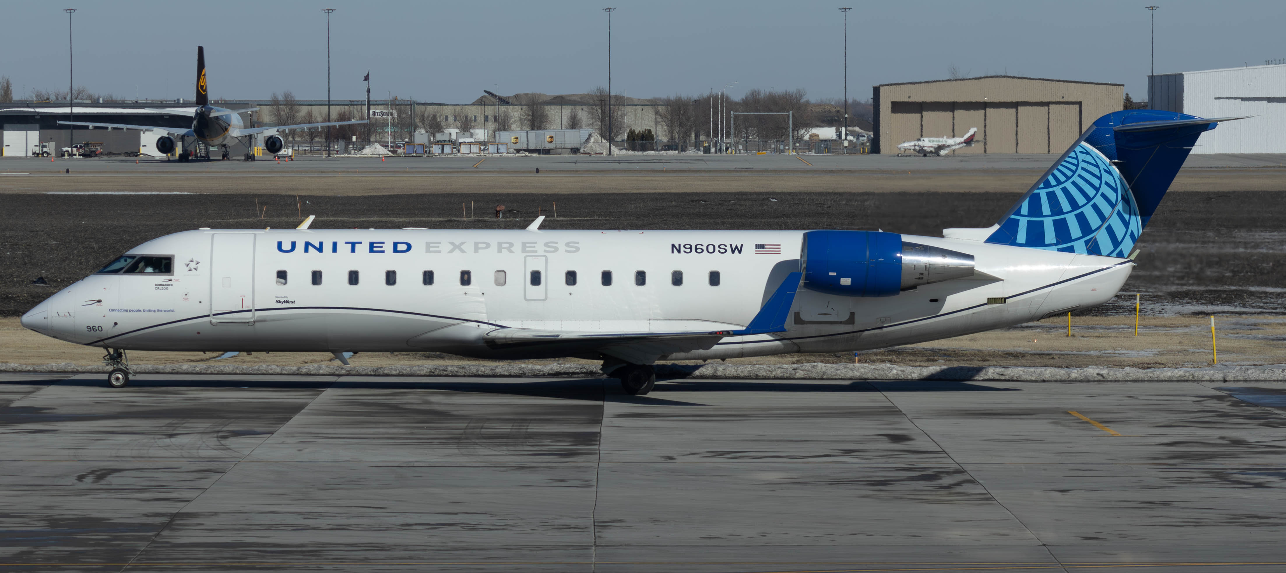 Full size: United Express Mitsubishi CRJ-200 N960SW at Hector International Airport