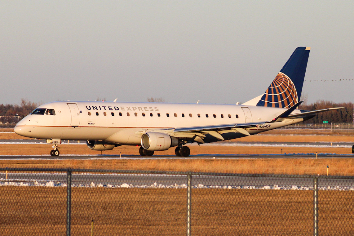 Full size: United Express Embraer E175 N204SY at Hector International Airport
