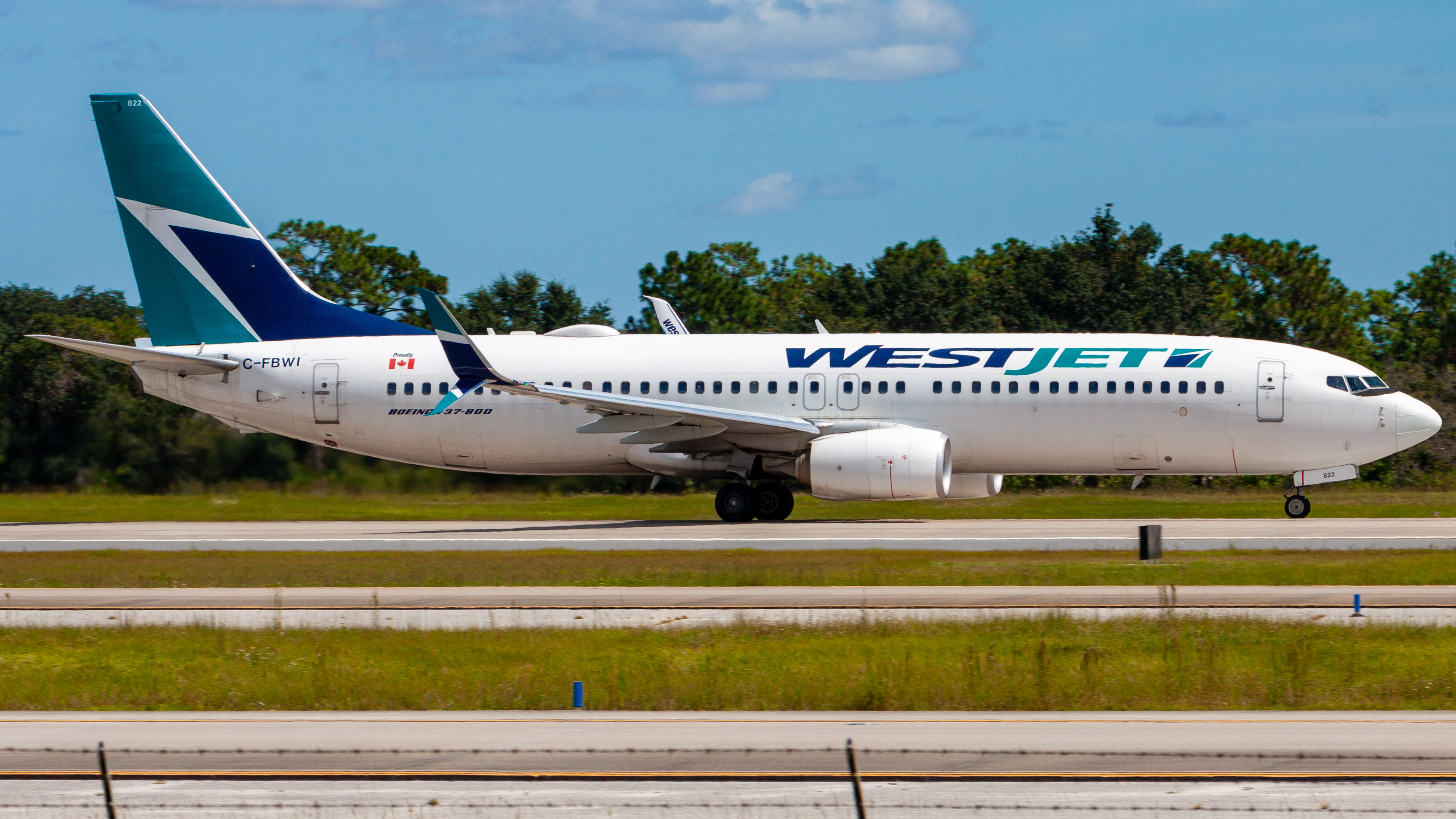 Full size: WestJet Boeing 737-800 C-FBWI at Orlando International Airport