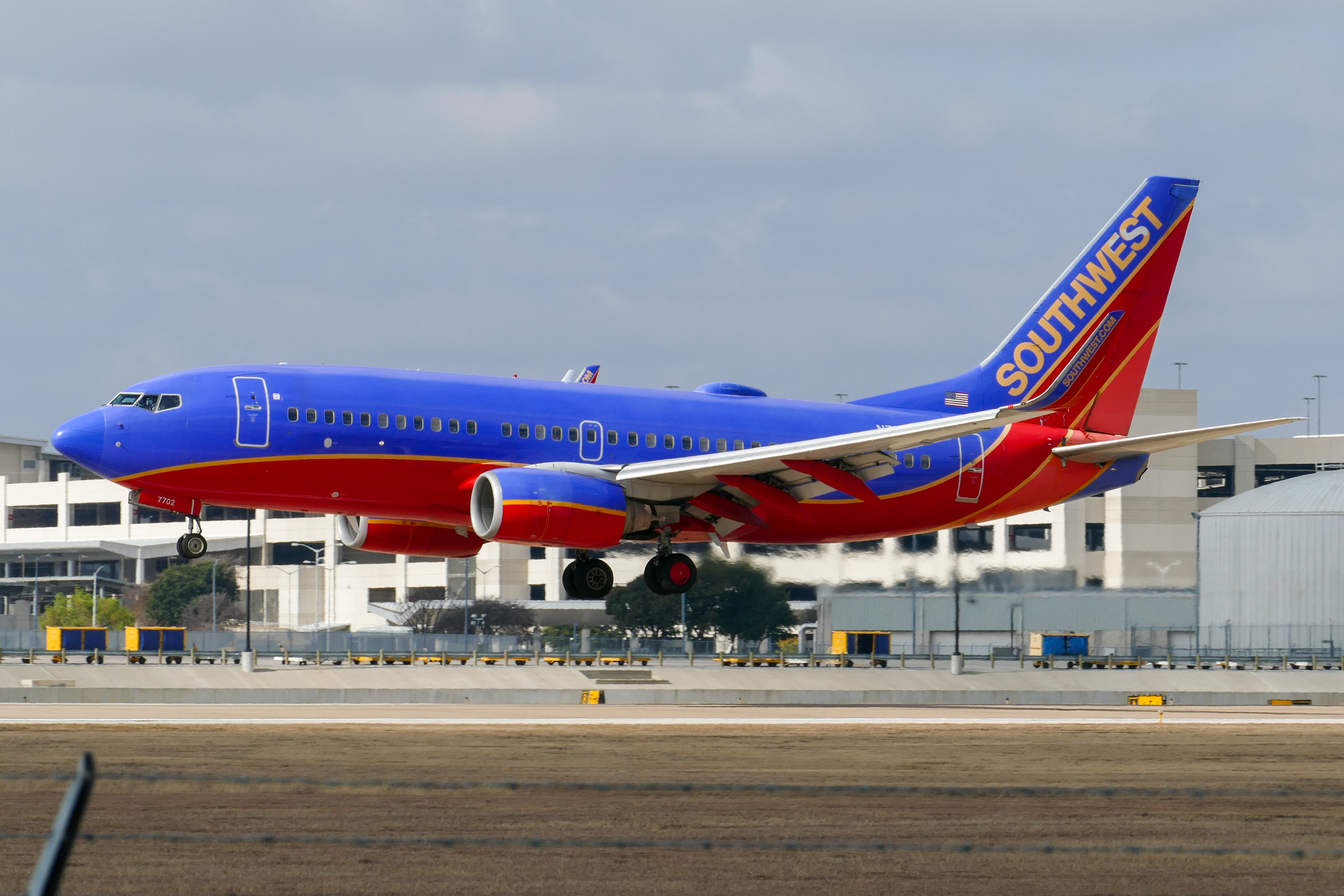 Full size: Southwest Airlines Boeing 737-7BD N7702A at Austin-Bergstrom International Airport