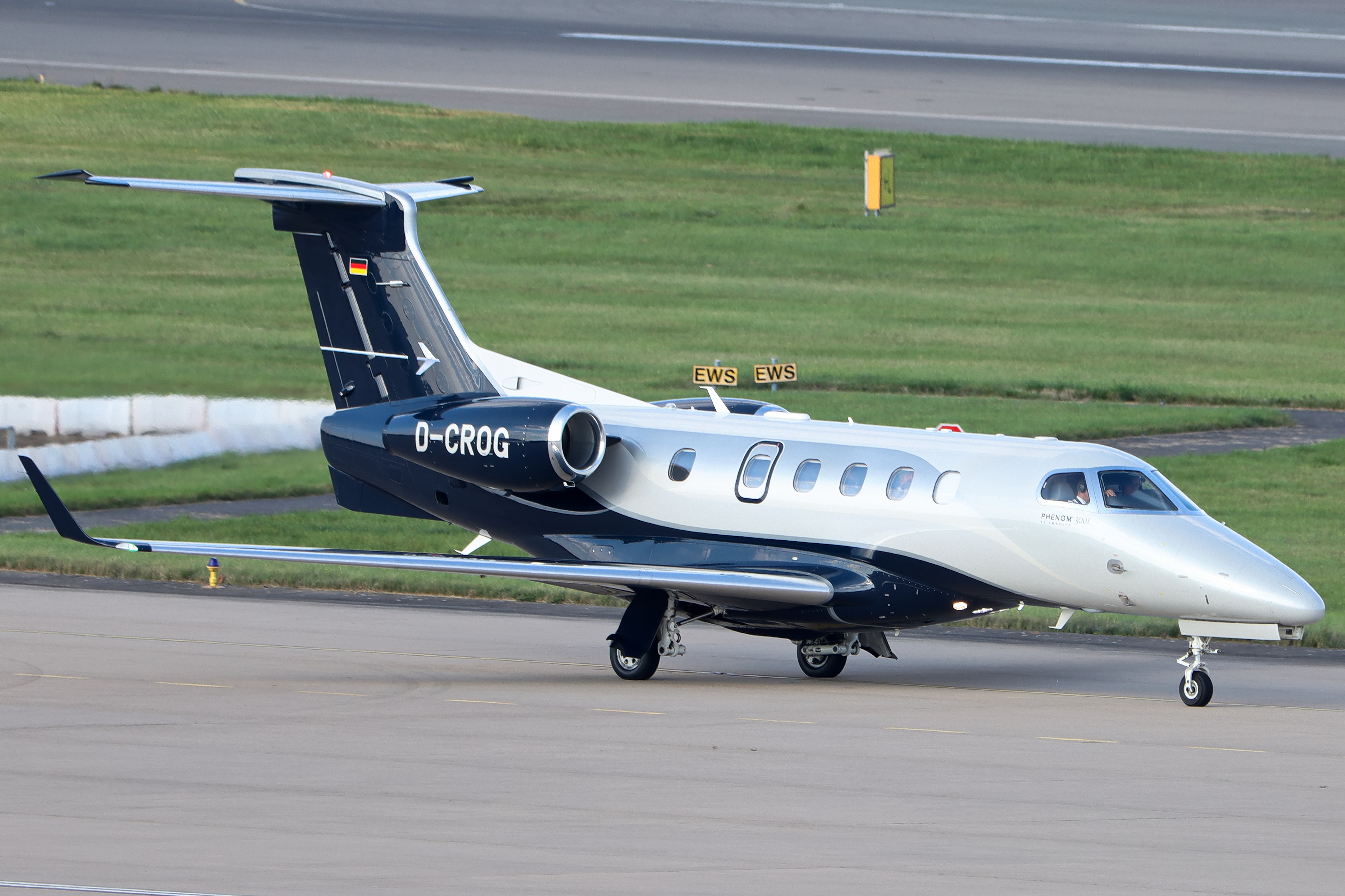 Full size: PRIVATE Embraer Phenom 300 D-CROG at Birmingham Airport