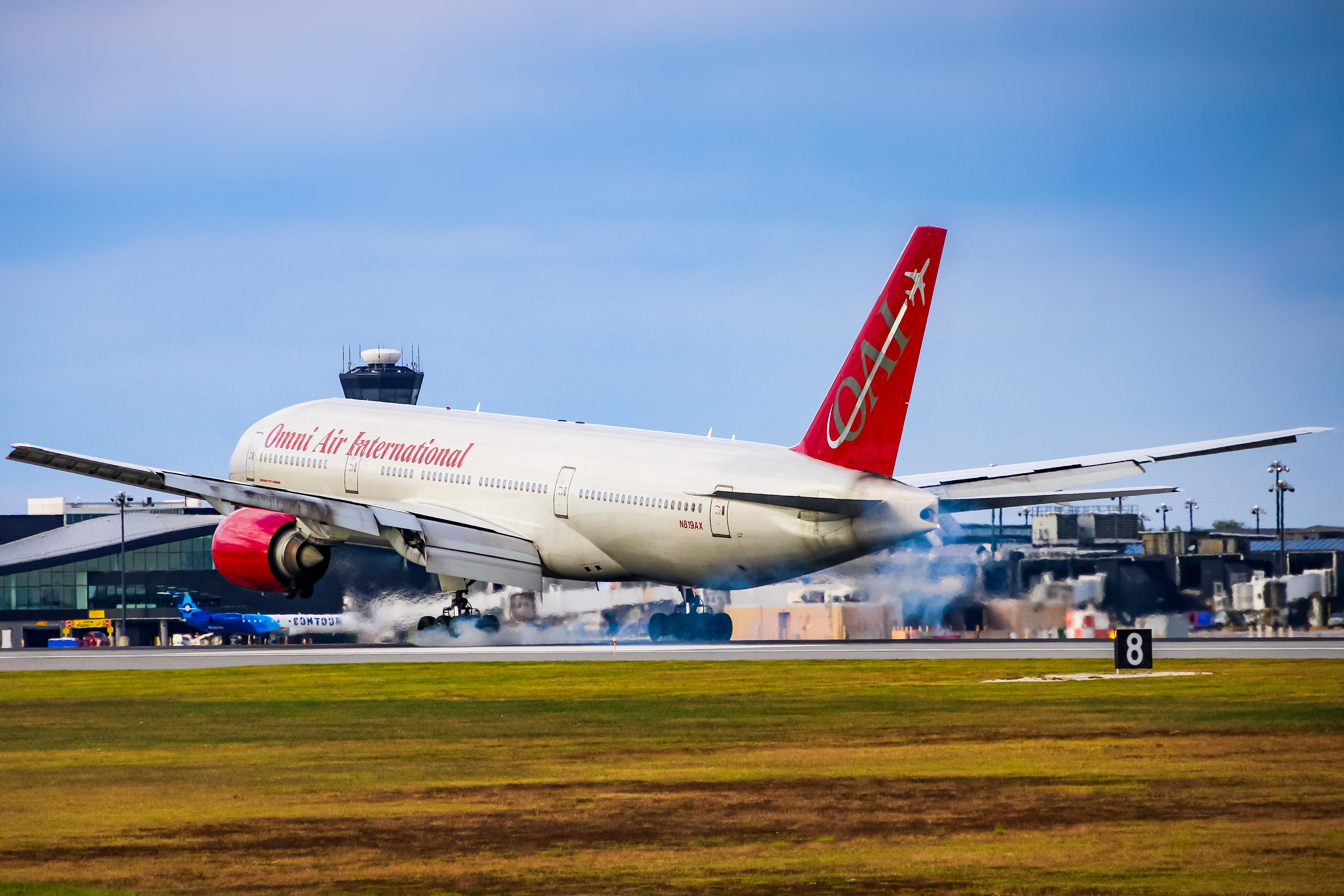 Full size: Omni Air International Boeing 777-200ER N819AX at Baltimore/Washington International Thurgood Marshall Airport