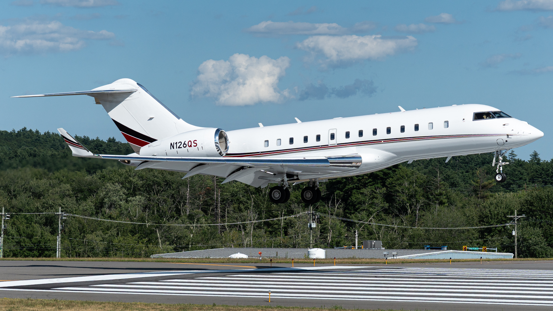Full size: NetJets  Bombardier Global 6500 N126QS at Manchester Airport