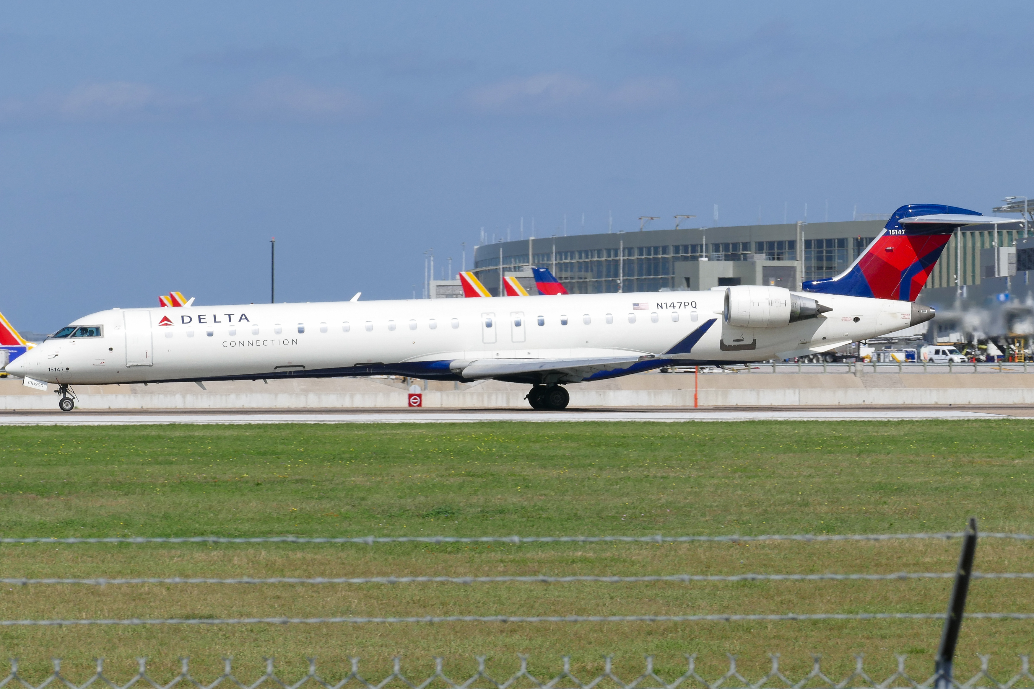Full size: Delta Airlines Mitsubishi CRJ-900 N147PQ at Austin-Bergstrom International Airport