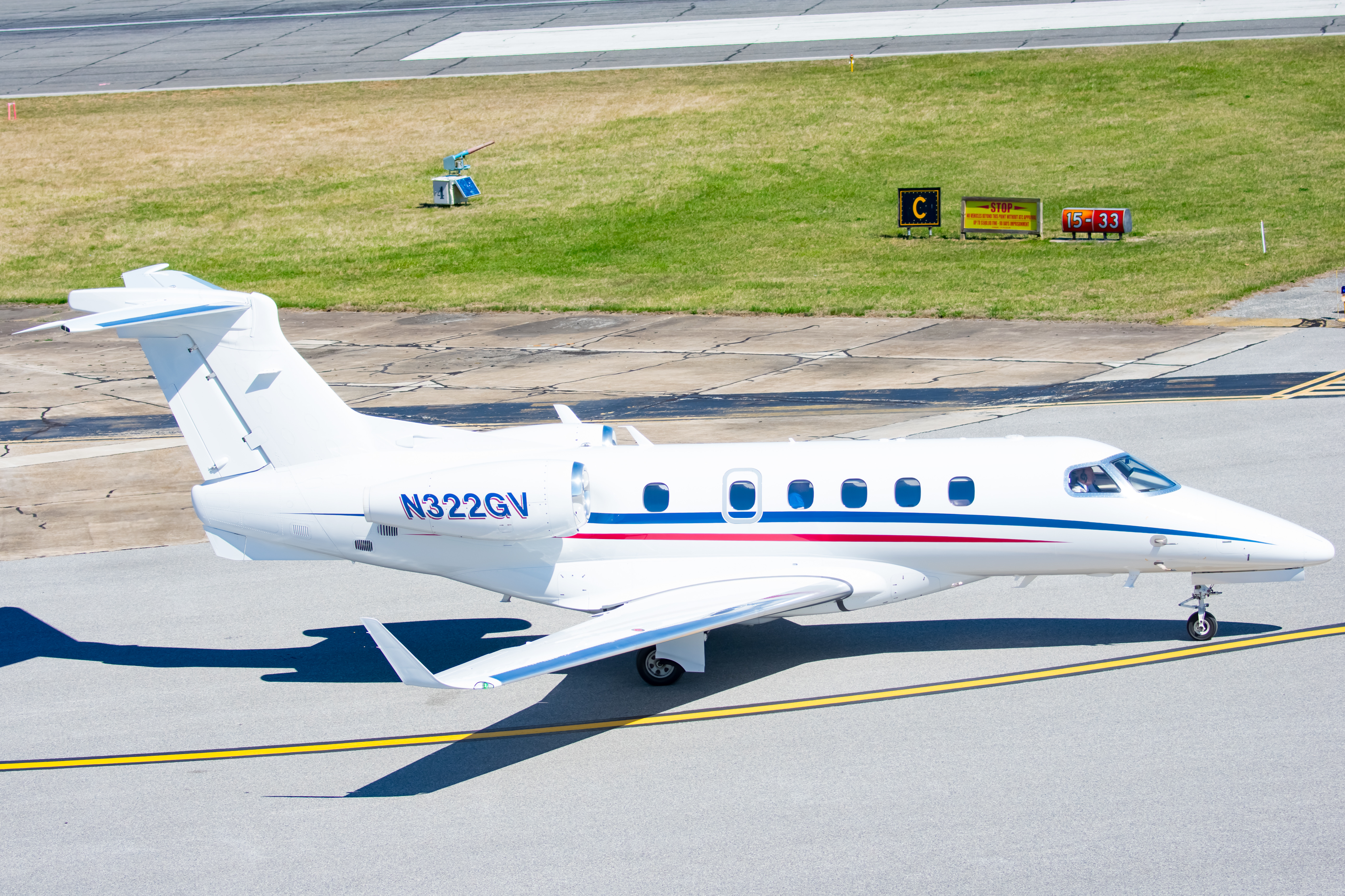Full size: PRIVATE Embraer Phenom 300 N322GV at Martin State Airport