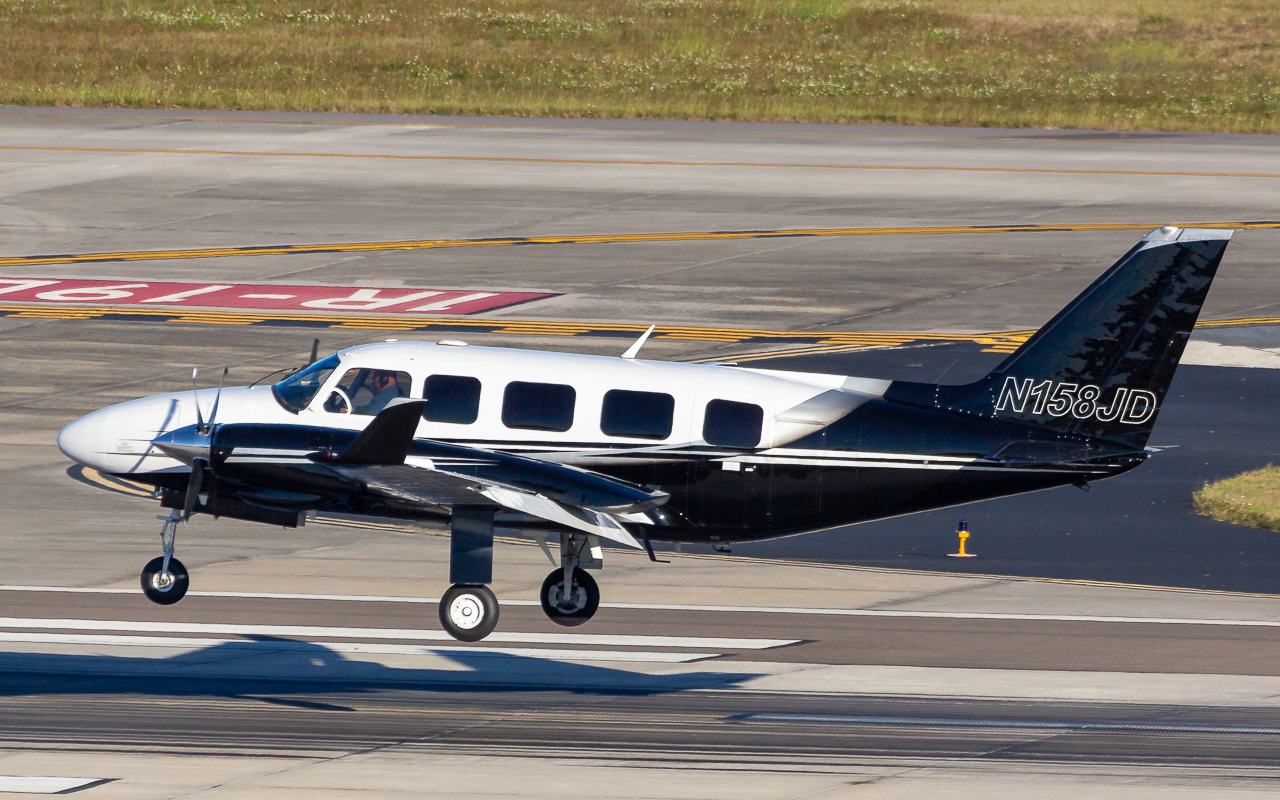 Full size: PRIVATE Piper 31 Navajo N158JD at Tampa International Airport