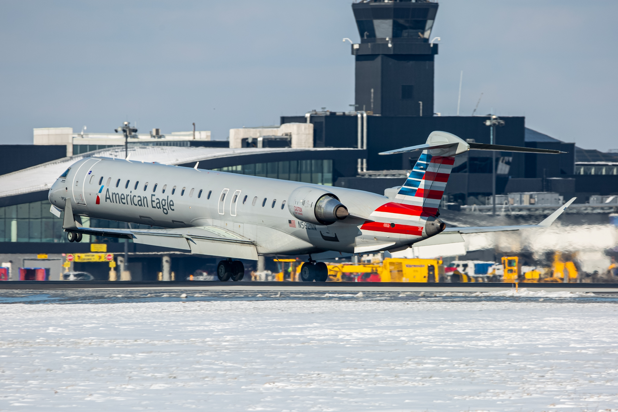 Full size: American Eagle Mitsubishi CRJ-900 N562NN at Baltimore/Washington International Thurgood Marshall Airport