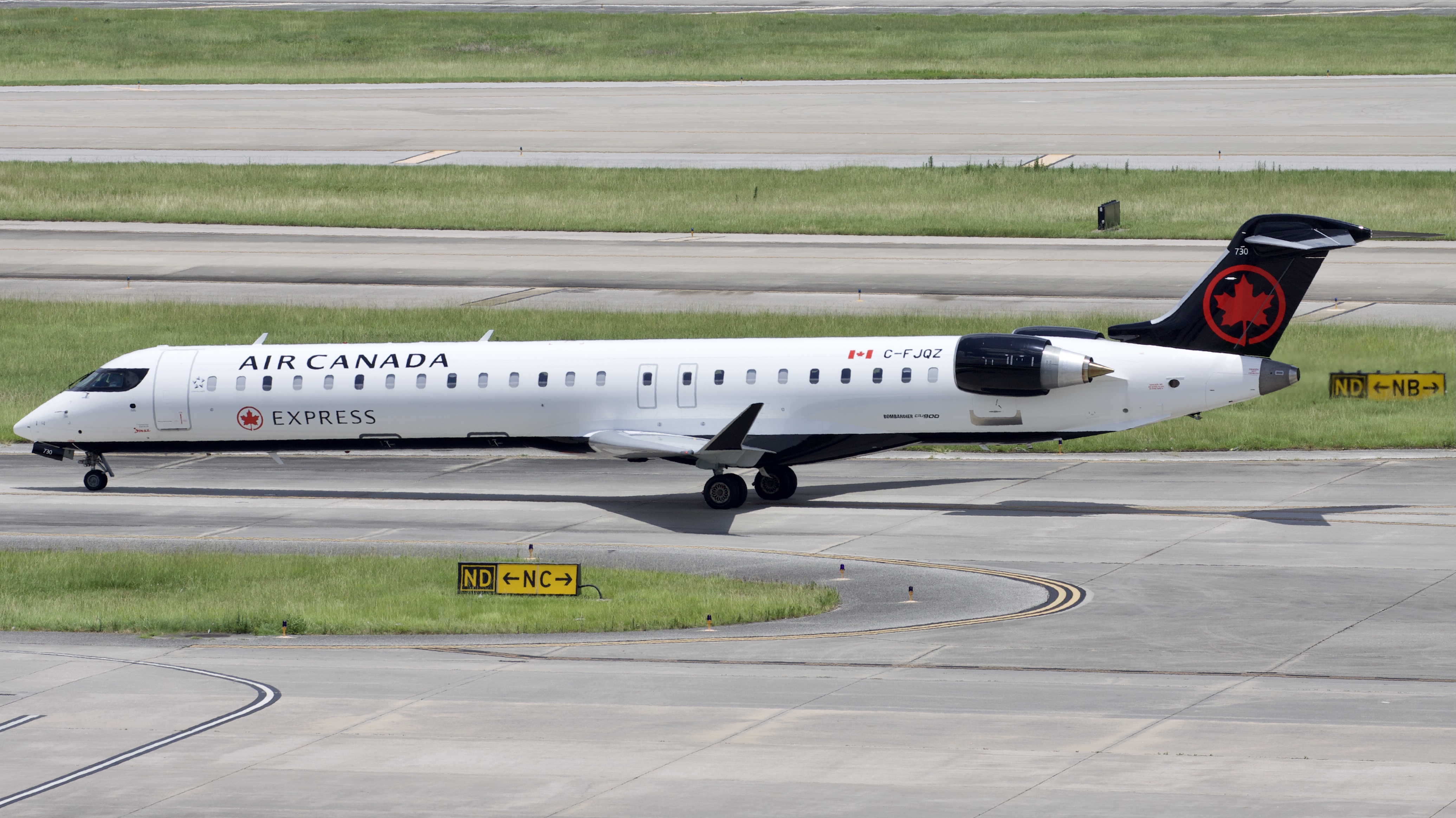 Full size: Air Canada Express Mitsubishi CRJ-900 C-FJQZ at Houston-George Bush Intercontinental Airport
