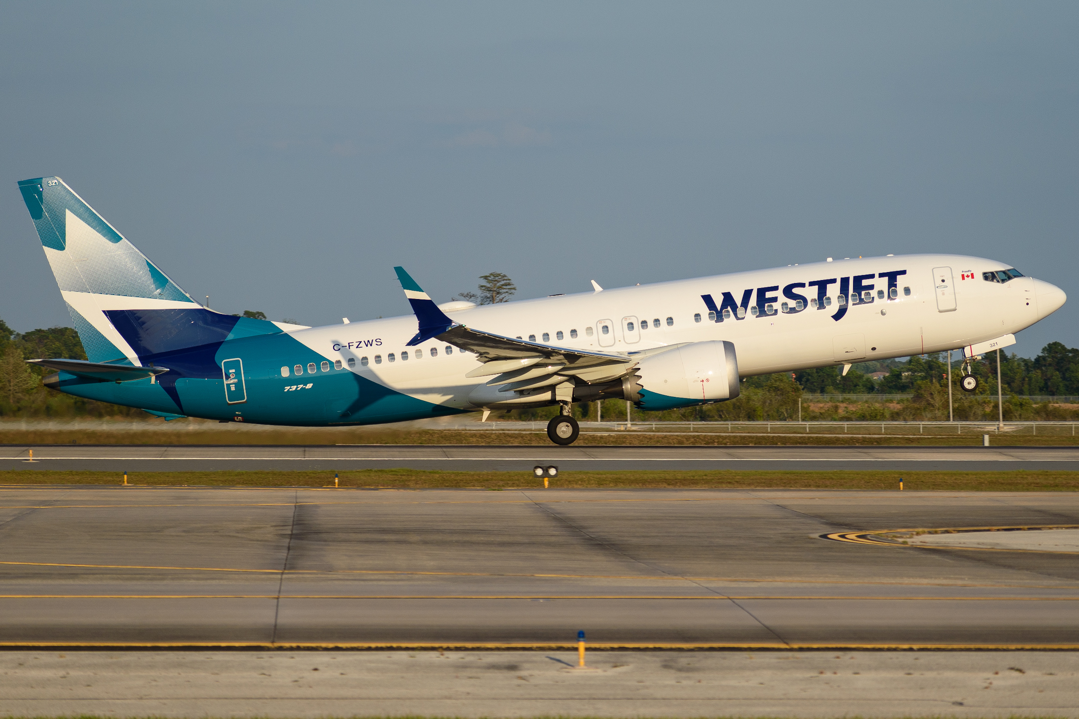 Full size: WestJet Boeing 737 MAX 8 C-FZWS at Orlando International Airport
