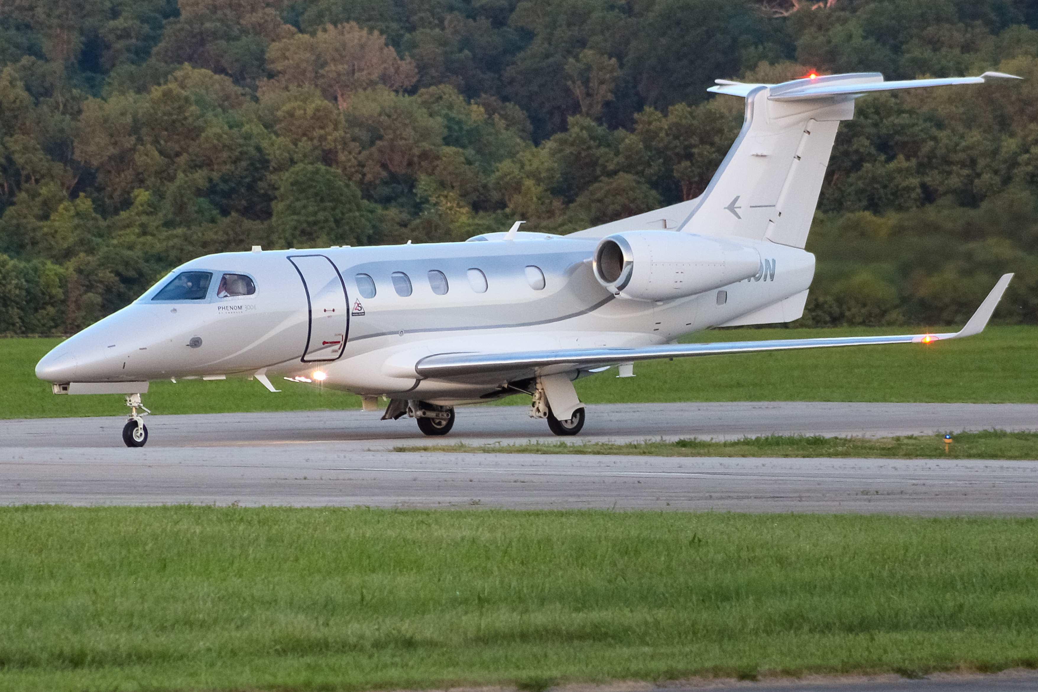 Full size: PRIVATE  Embraer Phenom 300 N/A at Cincinnati Municipal Airport/Lunken Field