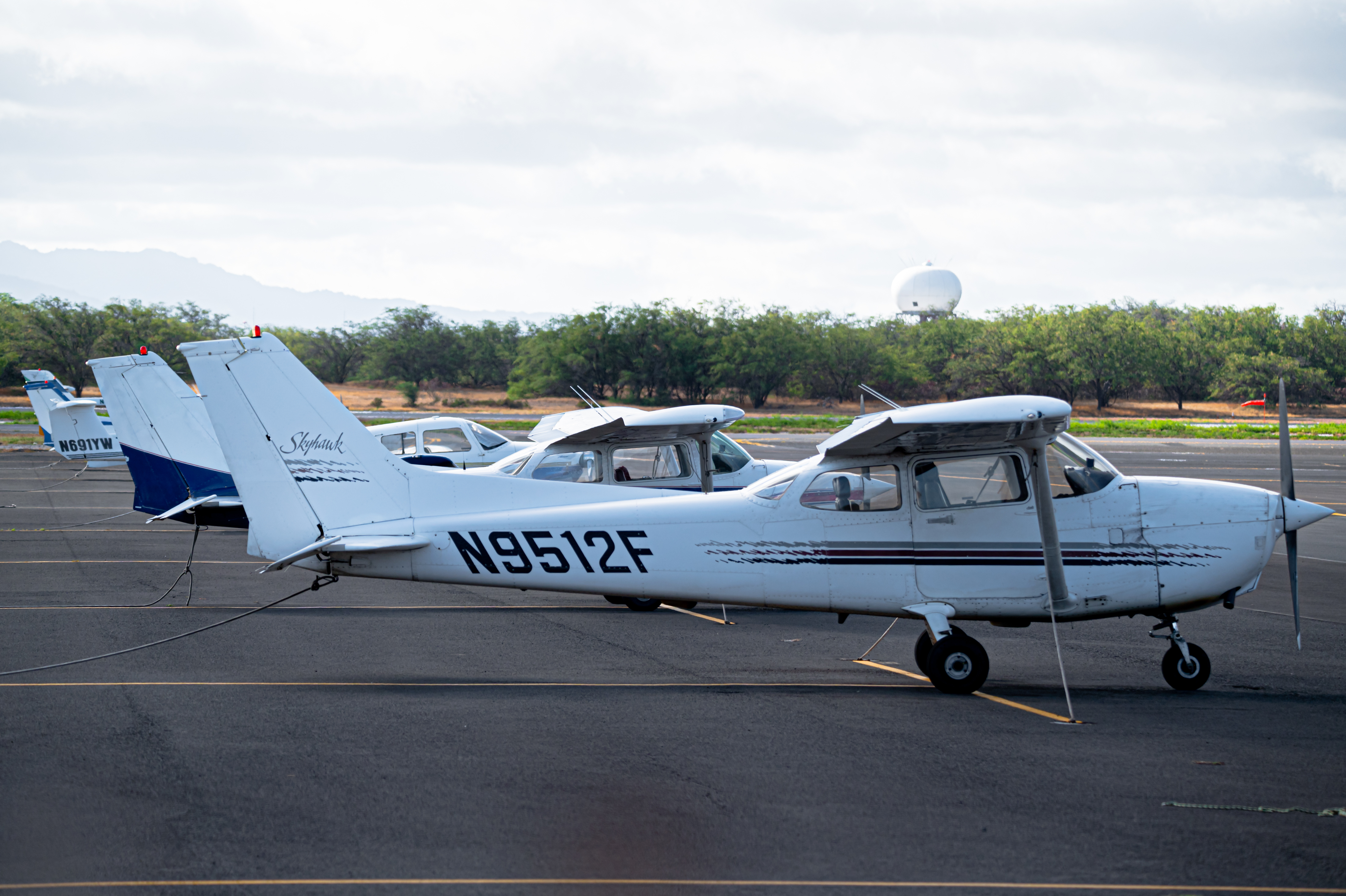Full size: SkyLink Aviation Cessna 172 N9512F at Daniel K Inouye International Airport