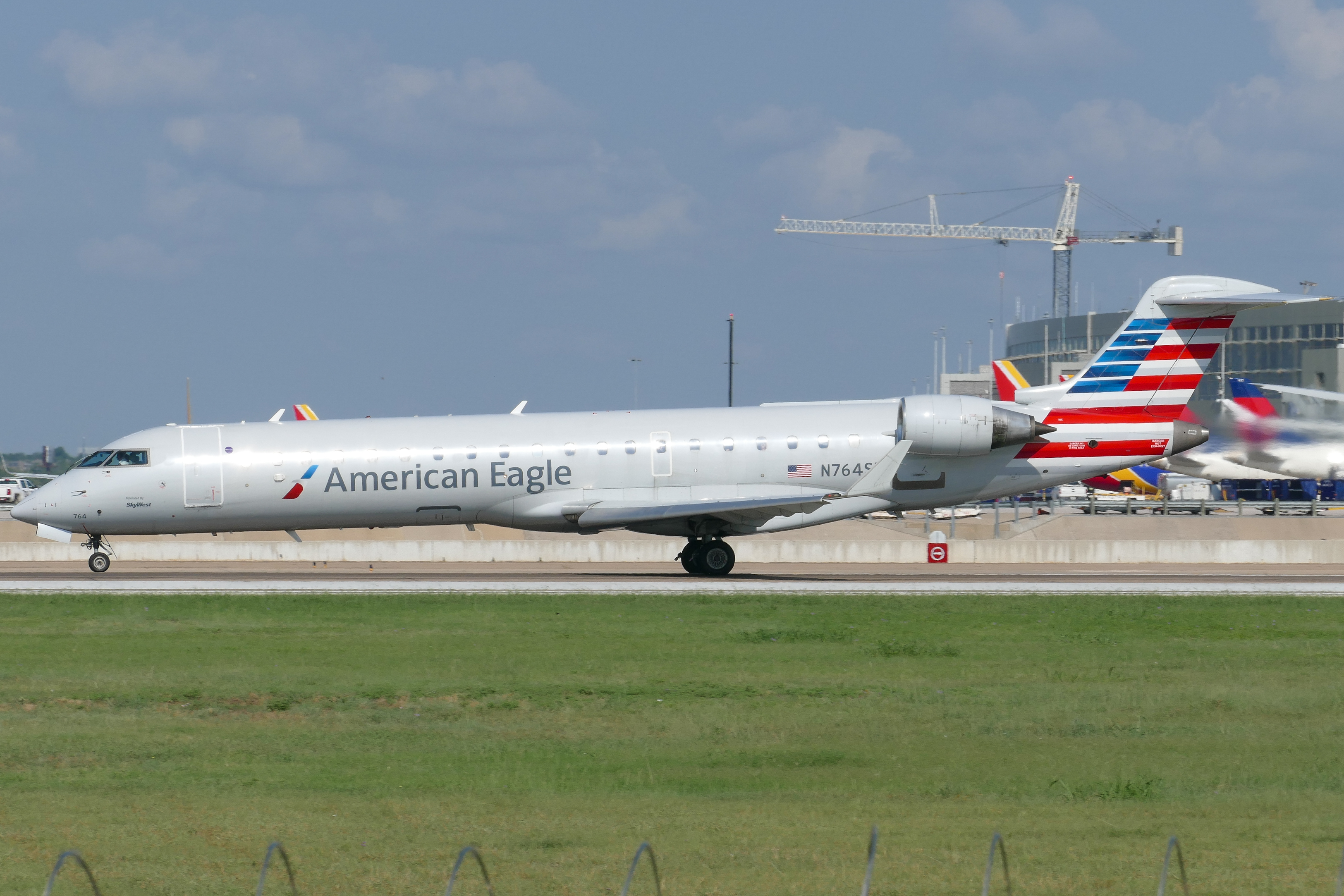 Full size: American Eagle Mitsubishi CRJ-700 N764SK at Austin-Bergstrom International Airport