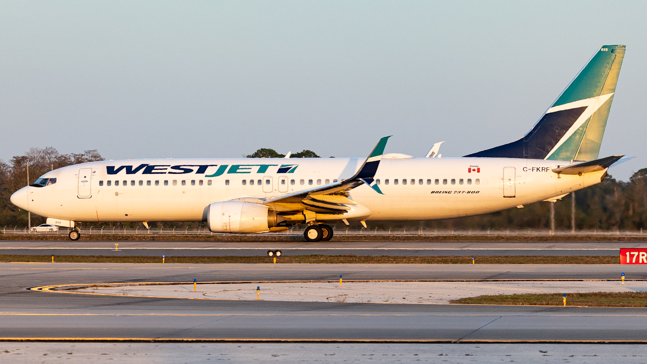 Full size: WestJet Boeing 737-800 C-FKRF at Orlando International Airport