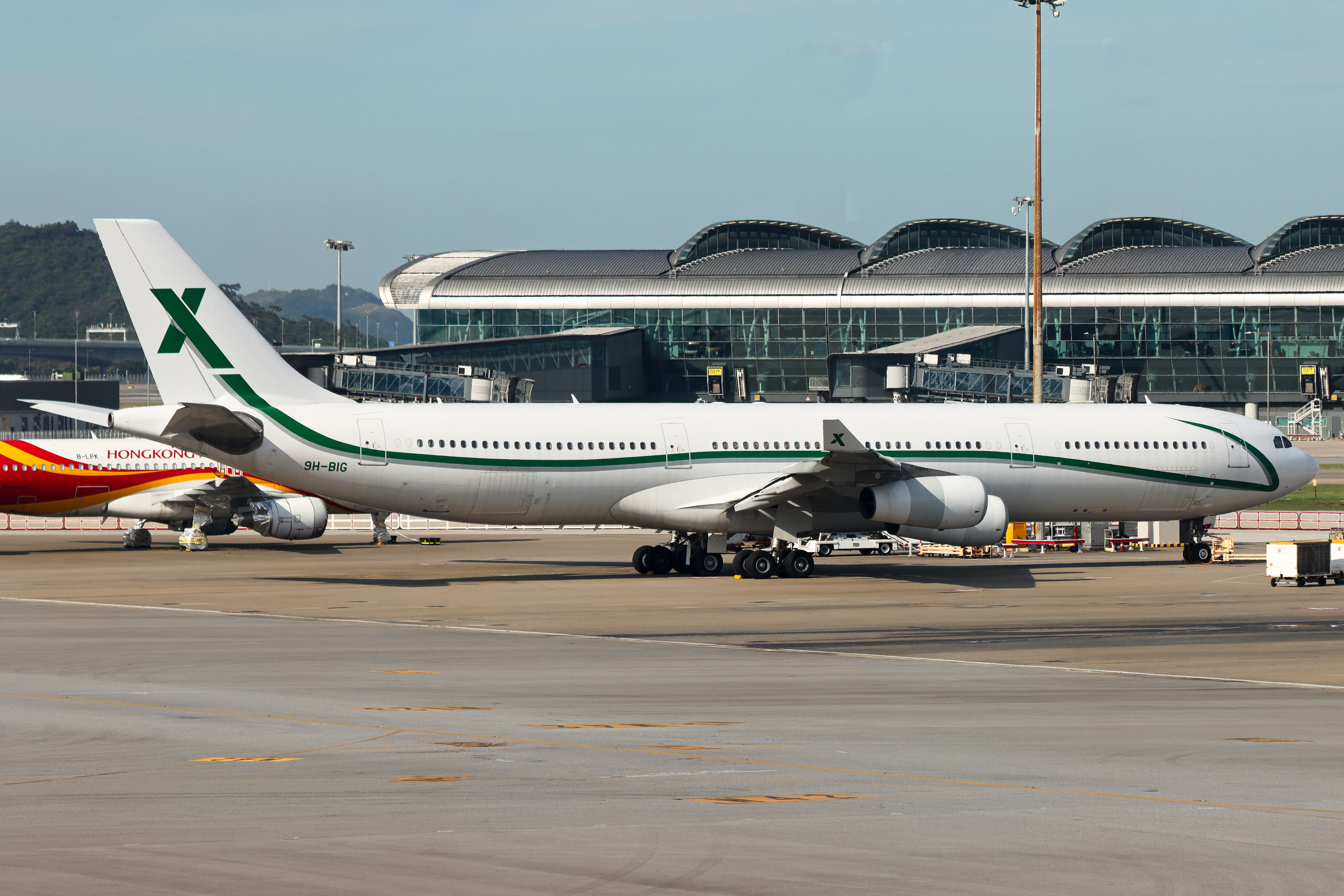 Full size: Air X Charter Airbus A340-300 9H-BIG at Hong Kong International Airport