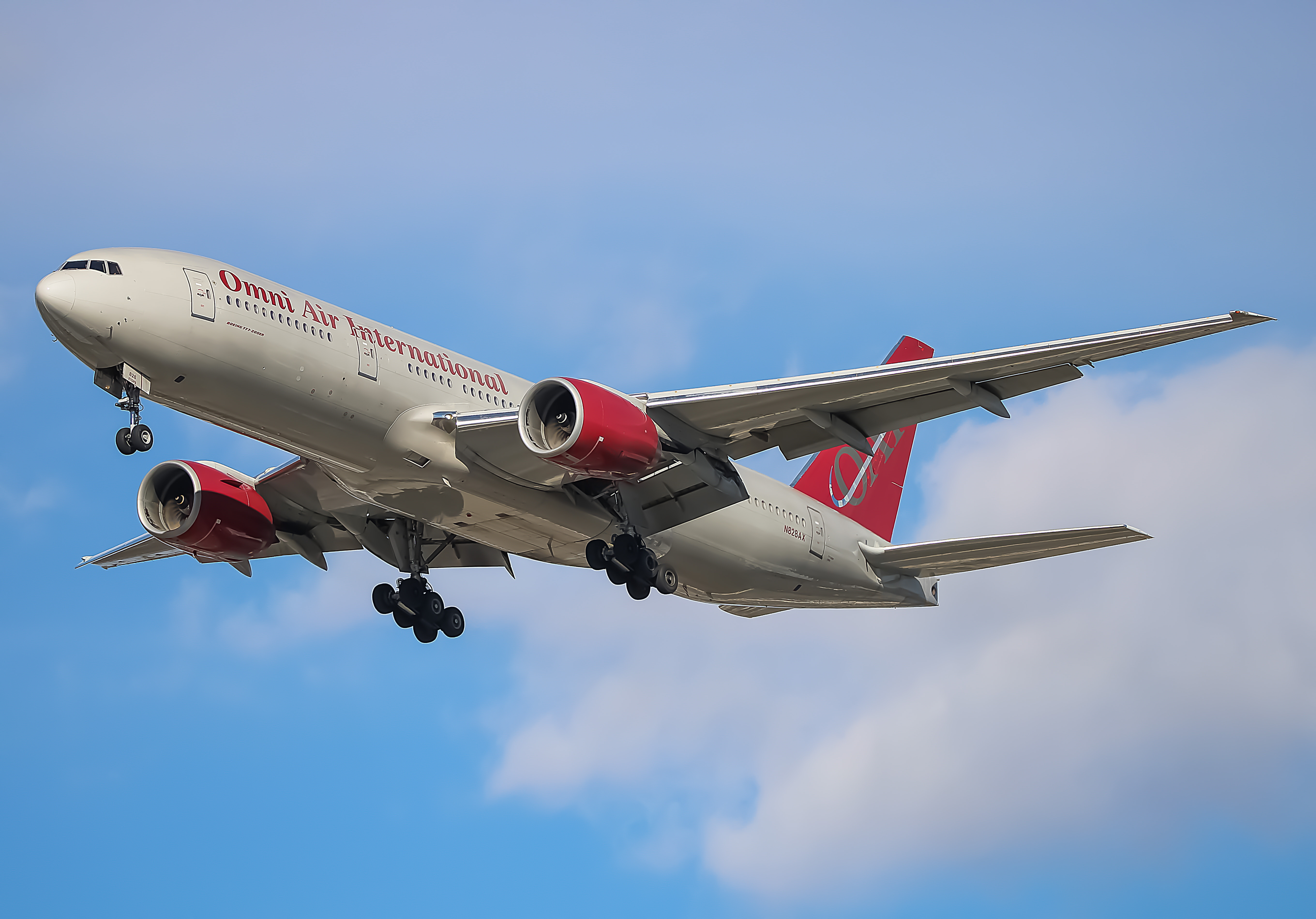 Full size: Omni Air International Boeing 777-200ER N828AX at Baltimore/Washington International Thurgood Marshall Airport