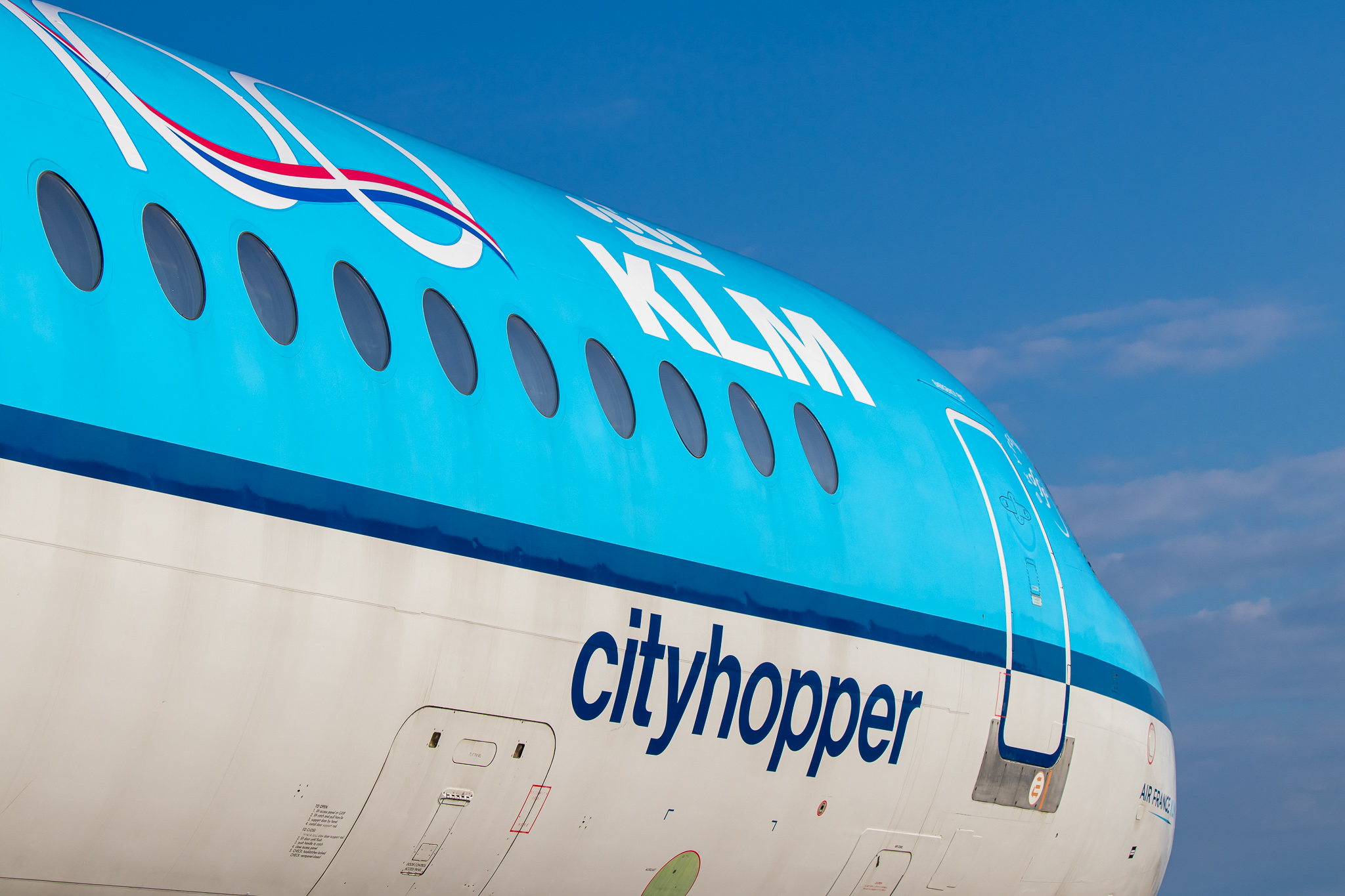 Full size: KLM CityHopper Fokker 100 PH-OFE at Amsterdam Schiphol Airport