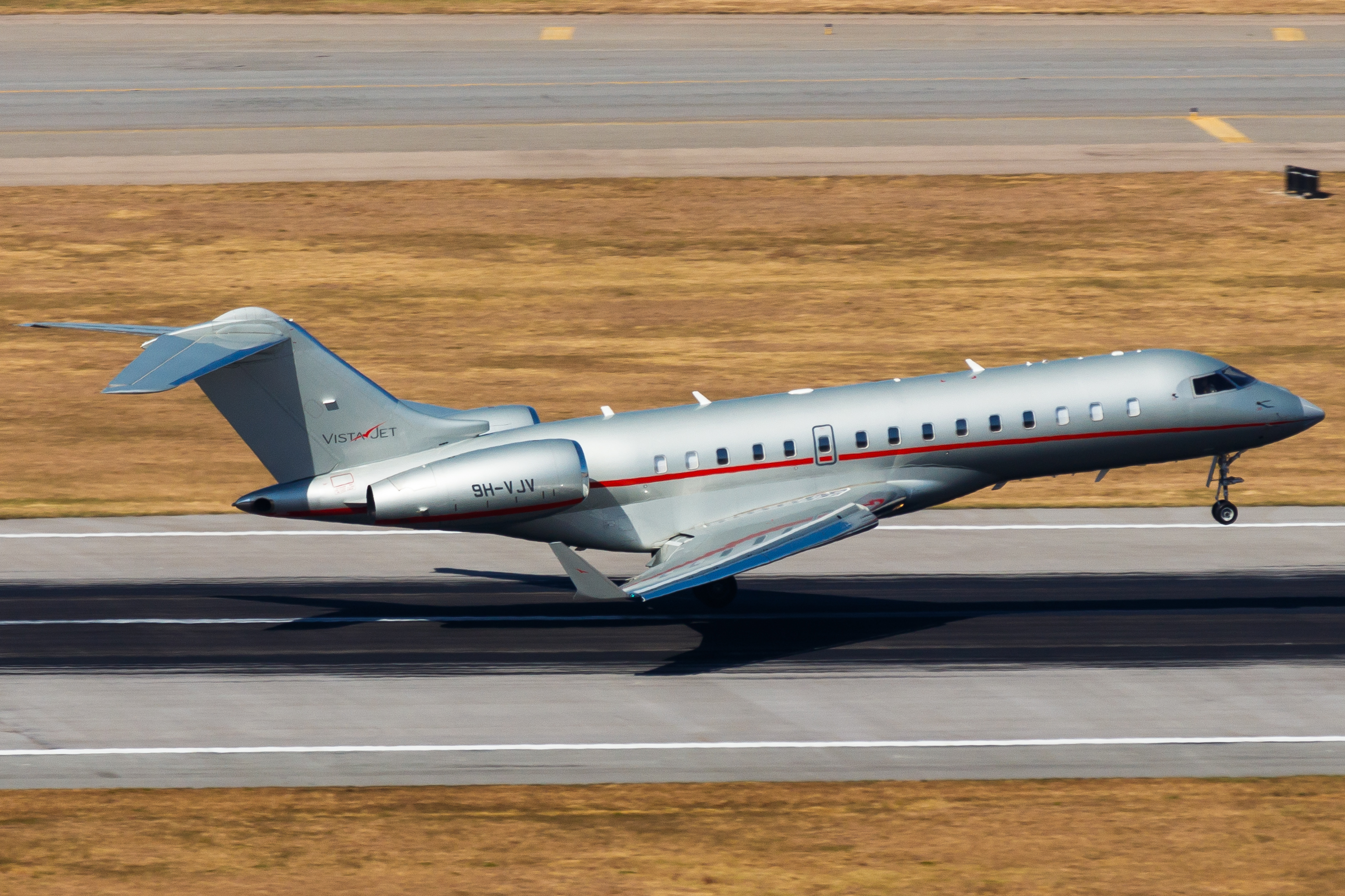 Full size: VistaJet Malta Bombardier Global 6000 9H-VJV at Hong Kong International Airport