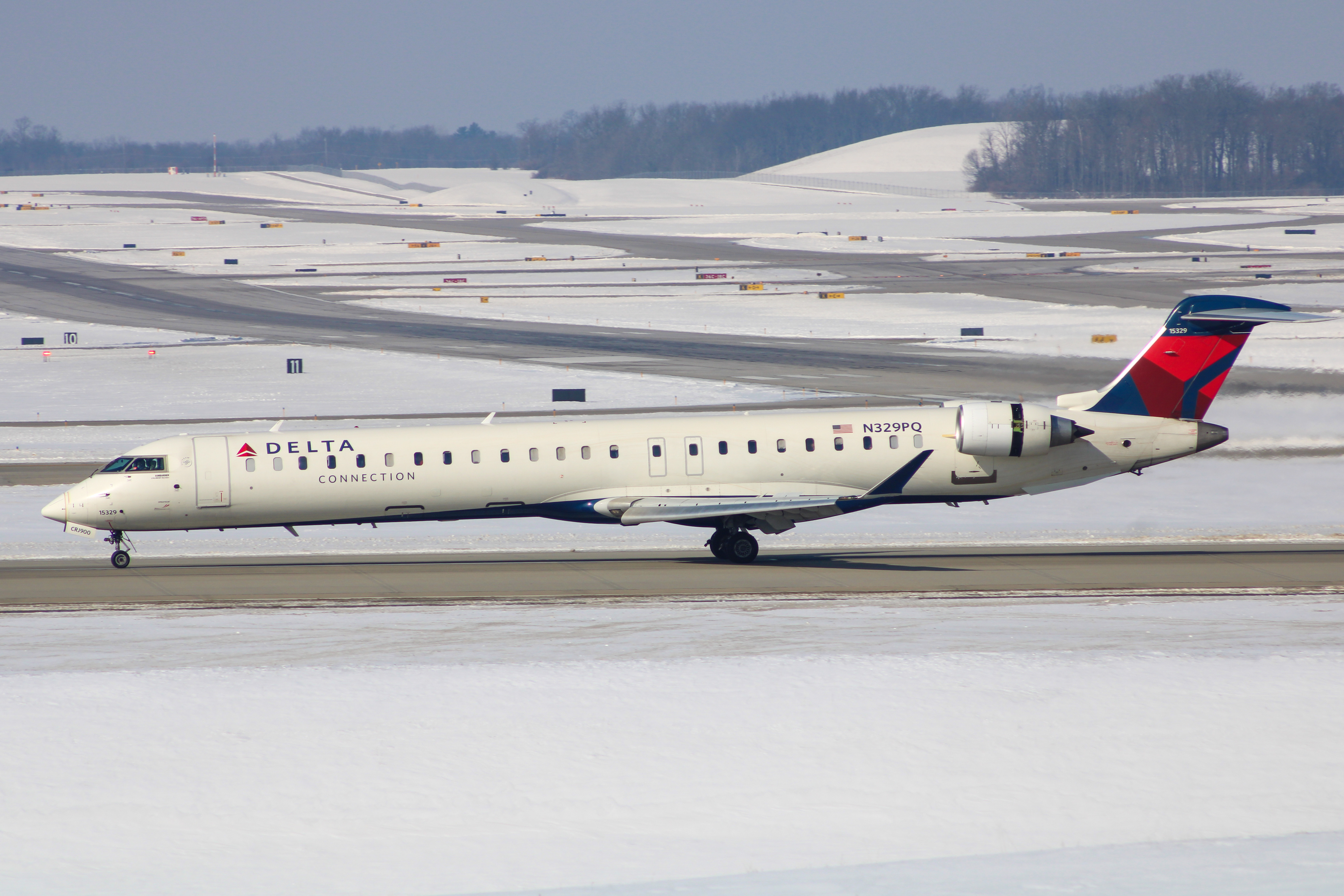 Full size: Delta Airlines Mitsubishi CRJ-900 N329PQ at Cincinnati/Northern Kentucky International Airport