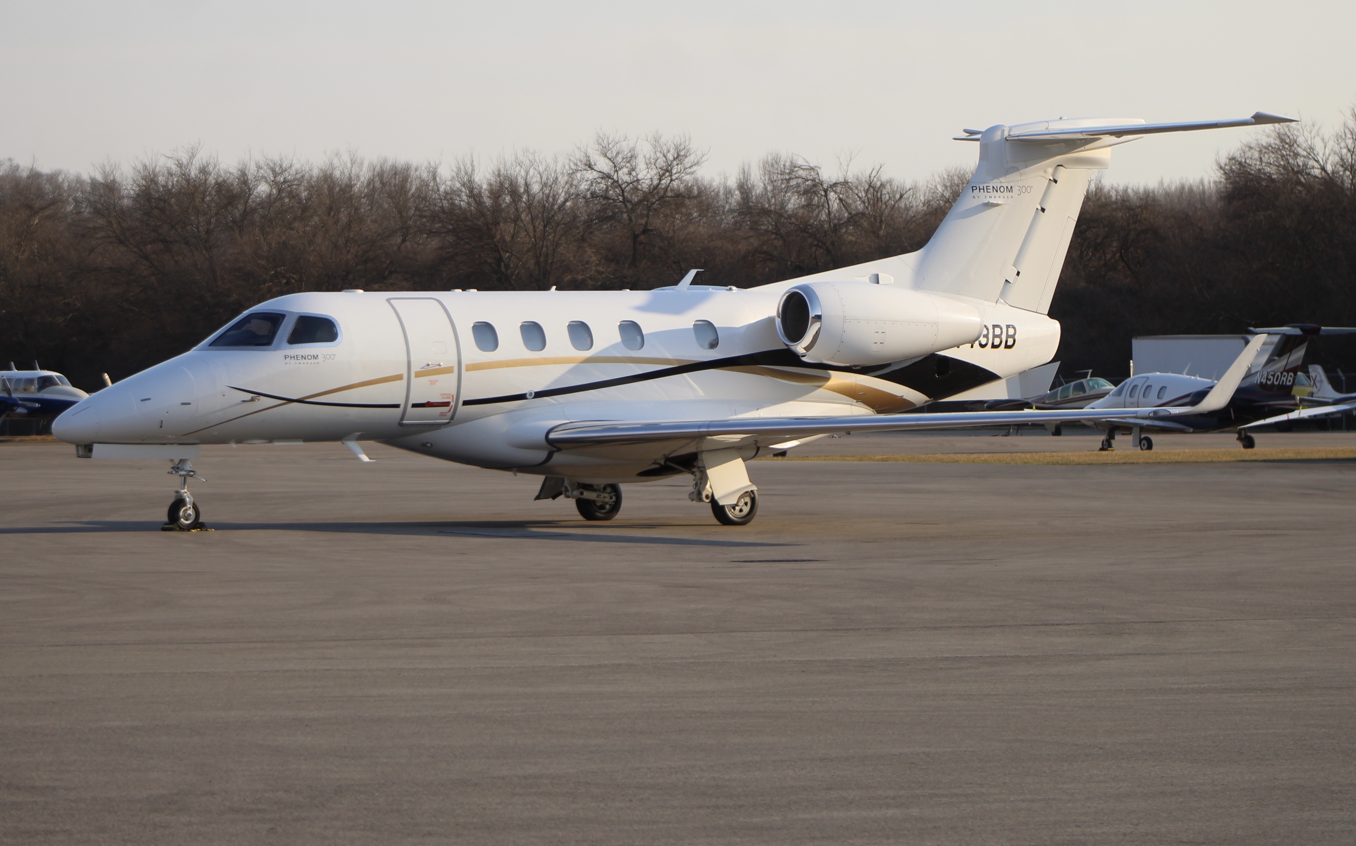 Full size: PRIVATE Embraer Phenom 300 N443BB at Cincinnati Municipal Airport/Lunken Field