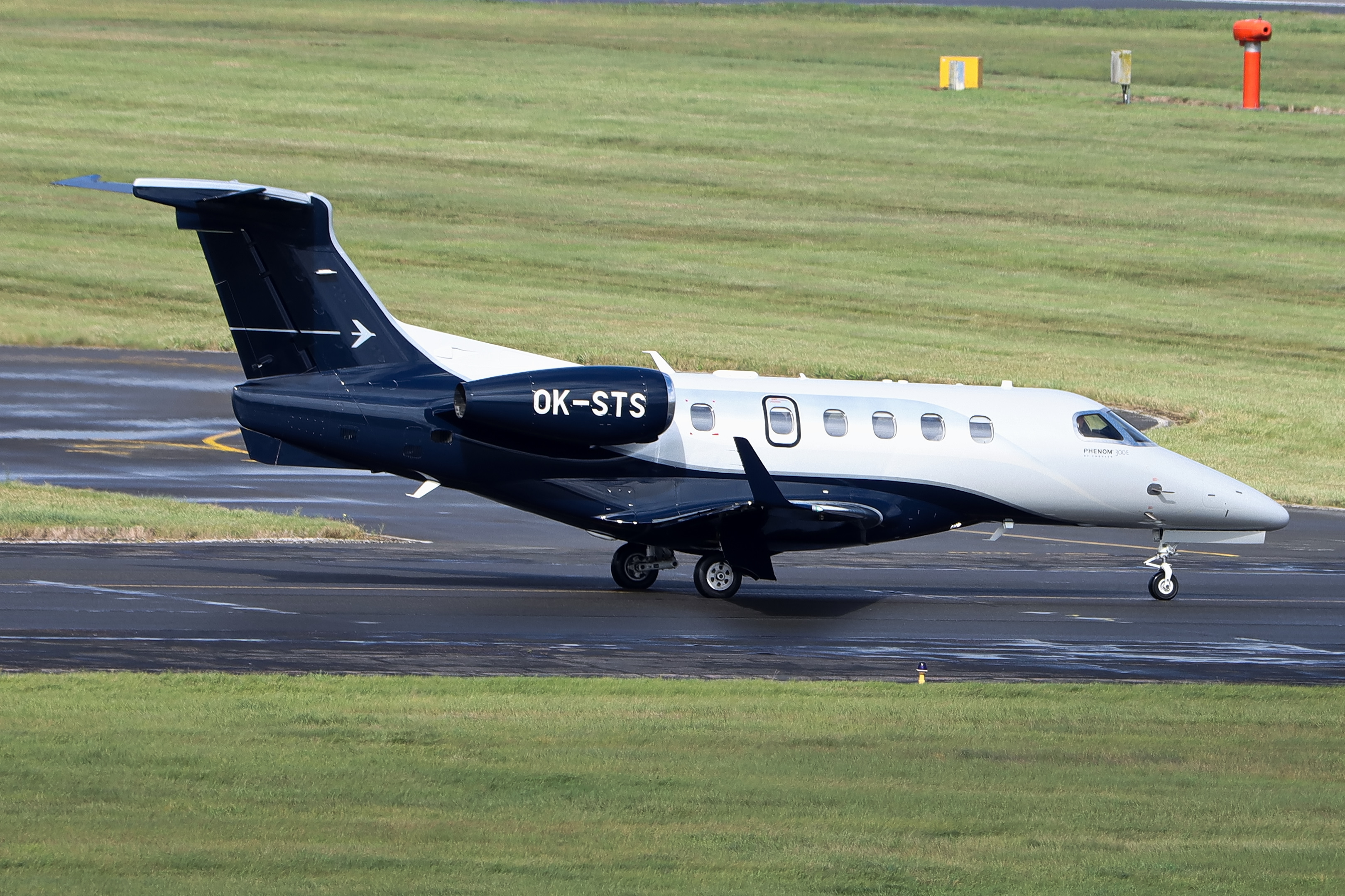 Full size: QA AVIATION Embraer Phenom 300 OK-STS at Birmingham Airport