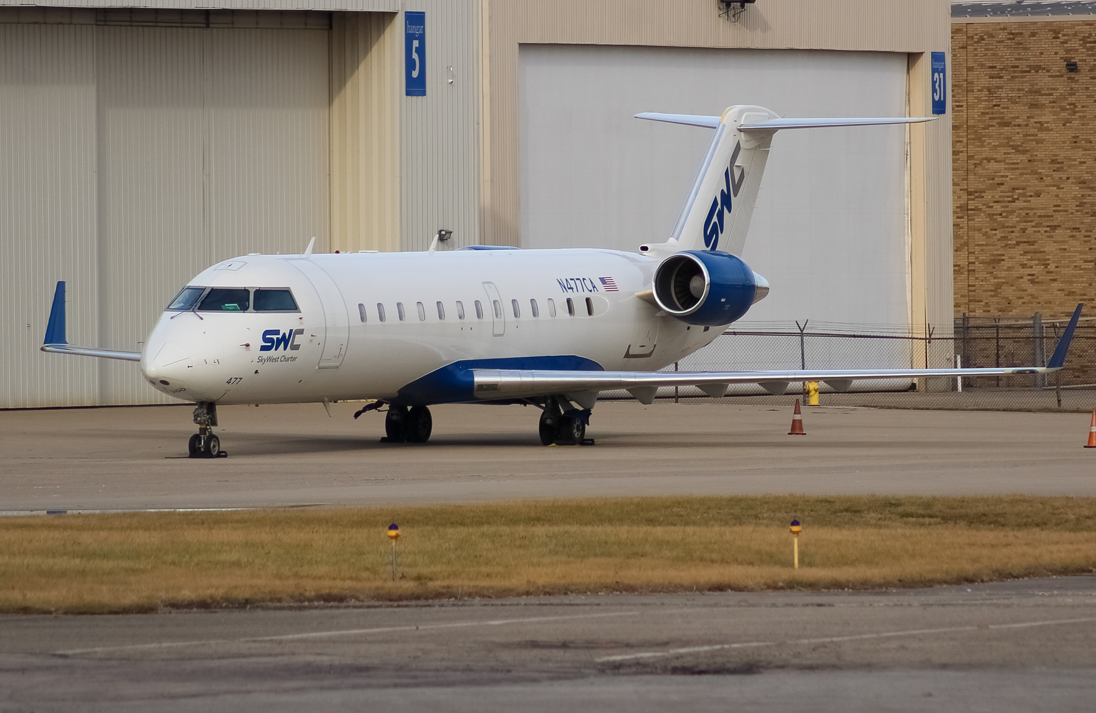 Full size: Skywest Charter Mitsubishi CRJ-200 N477CA at Cincinnati Municipal Airport/Lunken Field