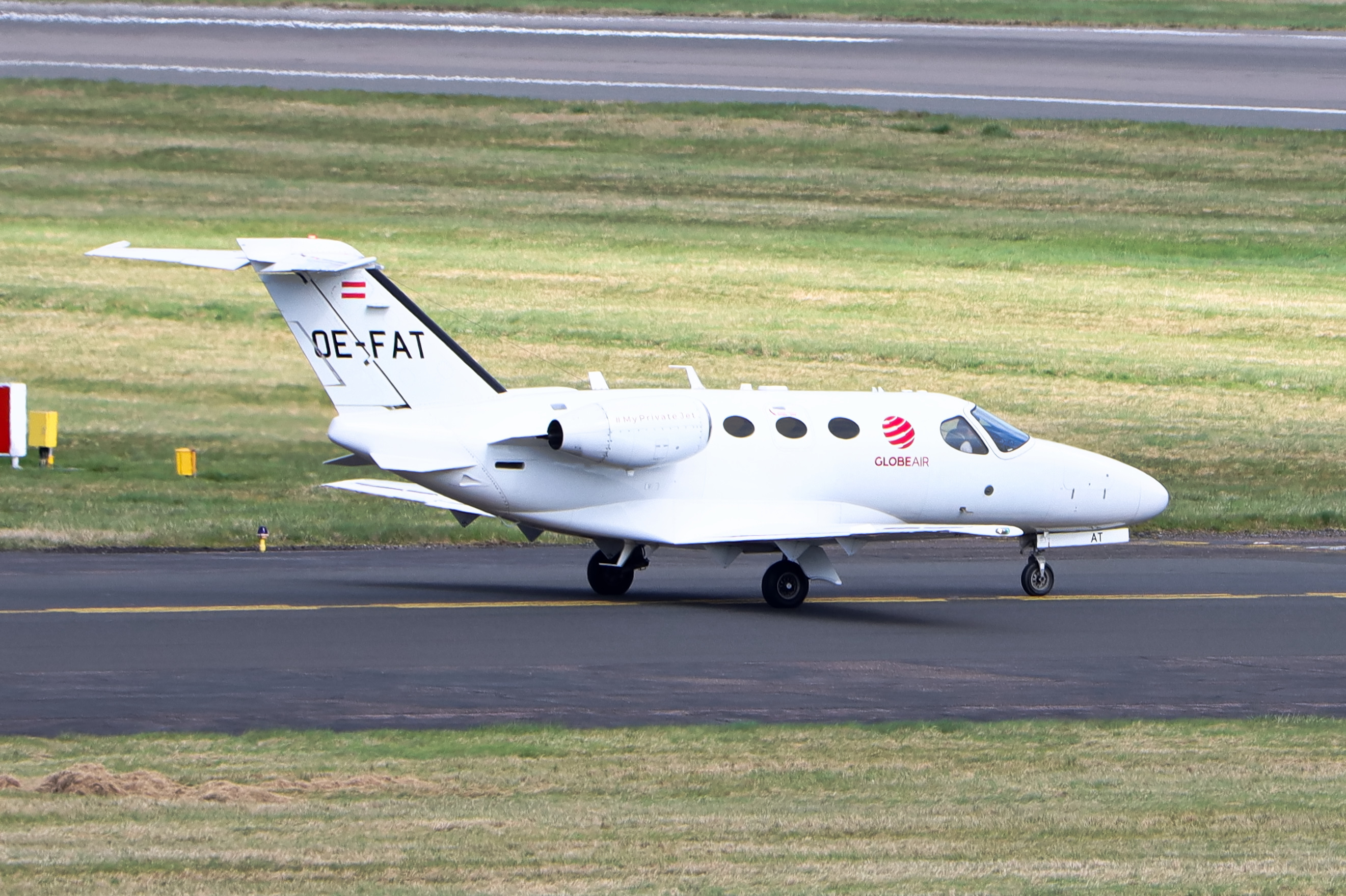 Full size: GlobeAir  Cessna Citation Mustang OE-FAT at Birmingham Airport