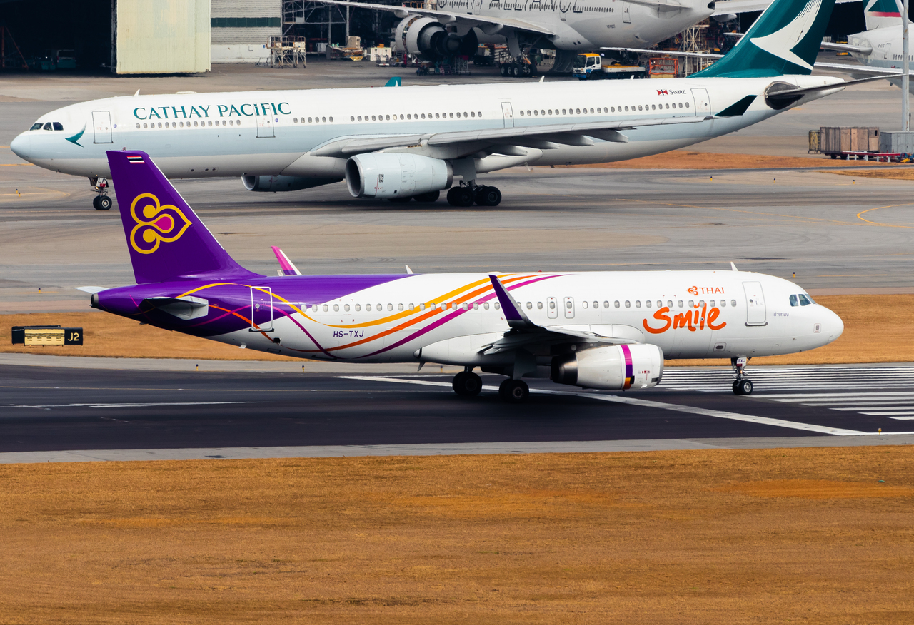Full size: Thai Smile Airbus A320 HS-TXJ at Hong Kong International Airport