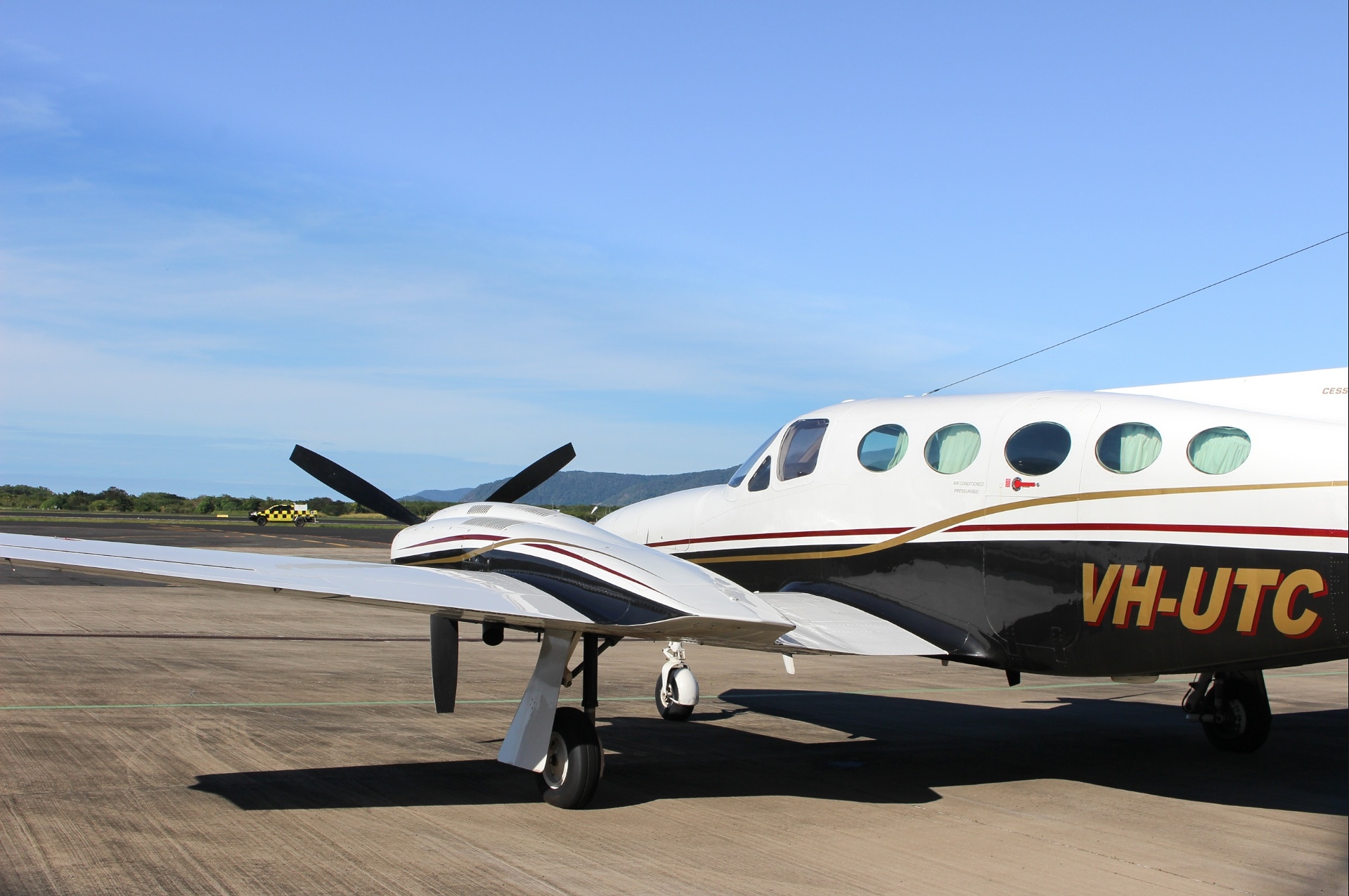 Full size: PRIVATE Cessna-421 VH-UTC at Cairns International Airport