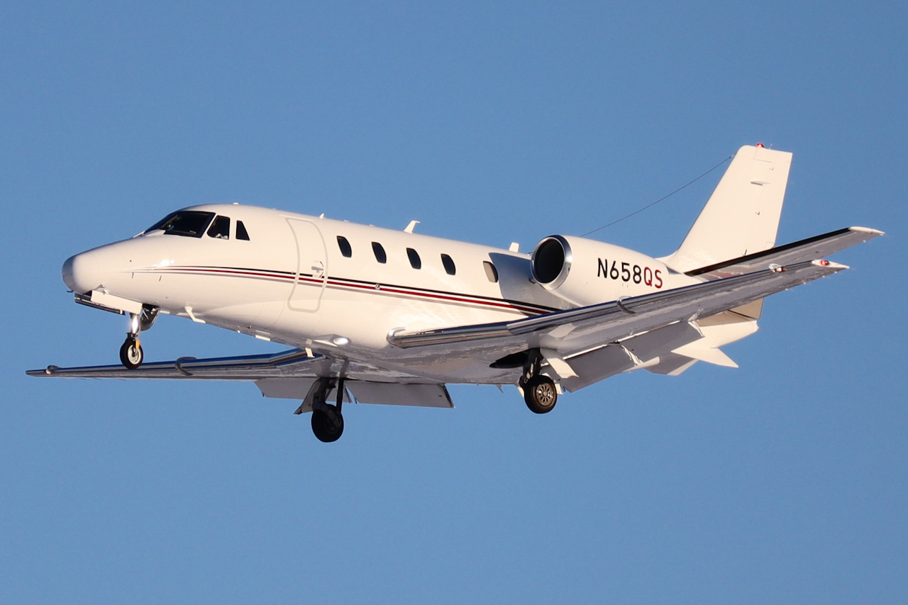Full size: NetJets Cessna Citation 560XL Excel N658QS at Manchester Airport