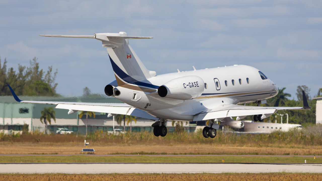 Full size: PRIVATE Embraer Legacy 450 C-GASE at Naples Municipal Airport