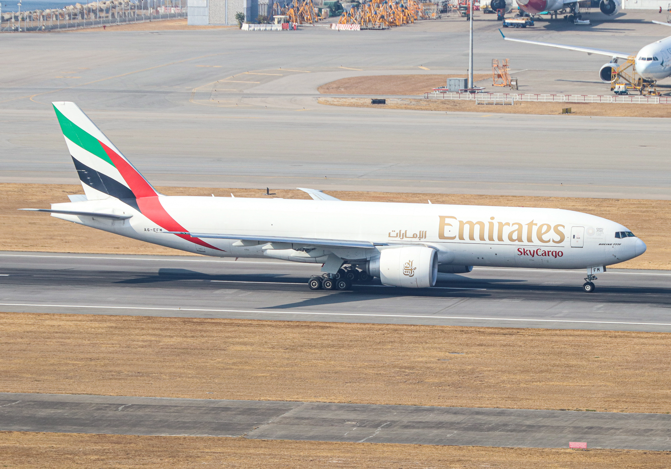Full size: Emirates SkyCargo Boeing 777F A6-EFM at Hong Kong International Airport