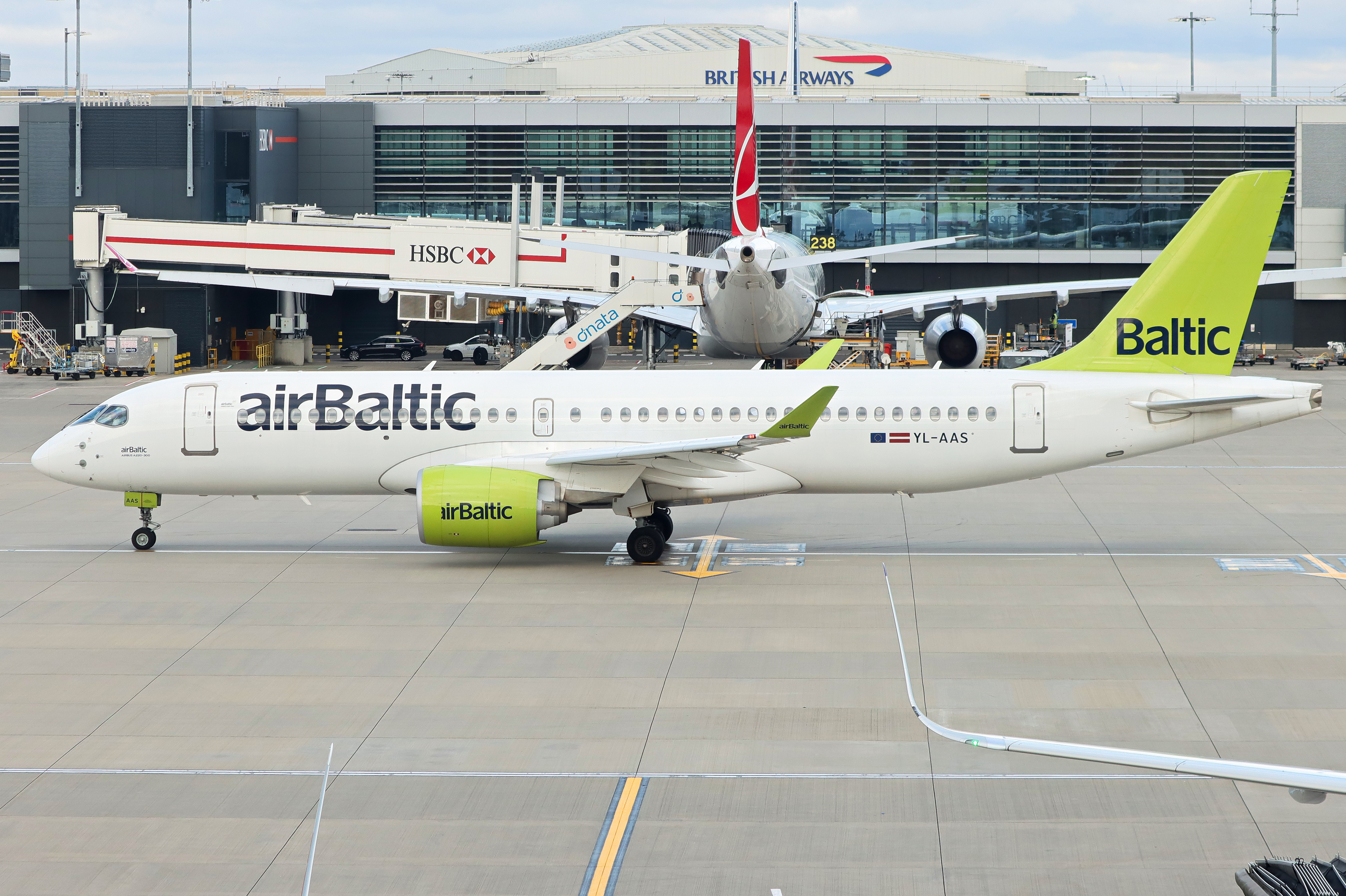 Full size: Air Baltic Airbus A220-300 YL-AAS at London Heathrow International Airport